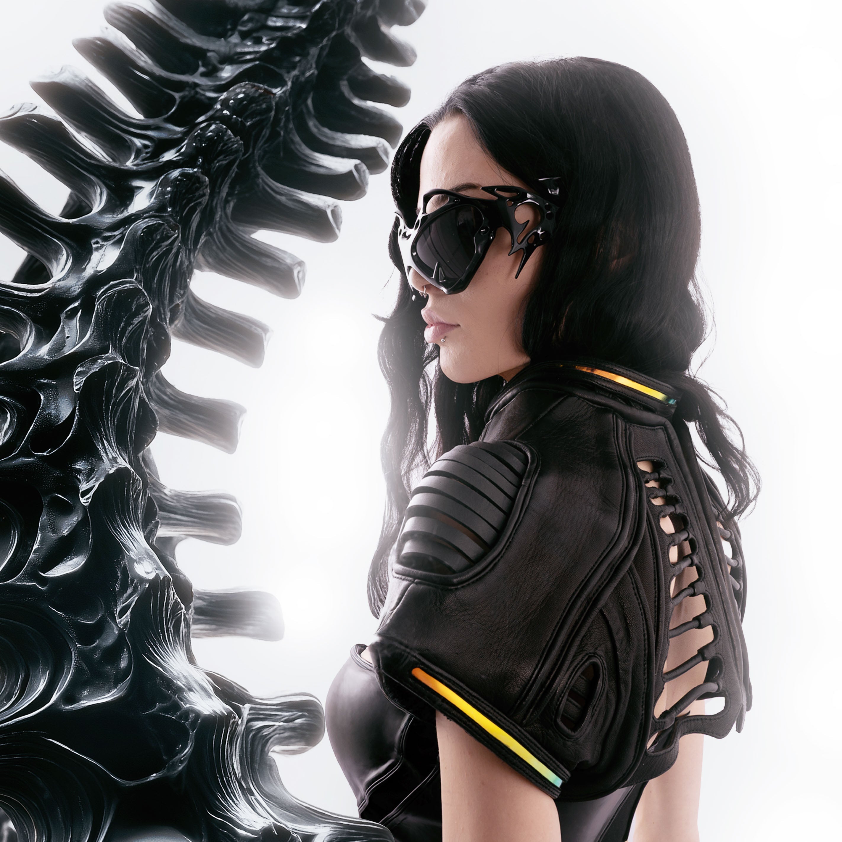 girl with rave sunglasses and avanagrde leatherjackete in front of white background whith 3D Art