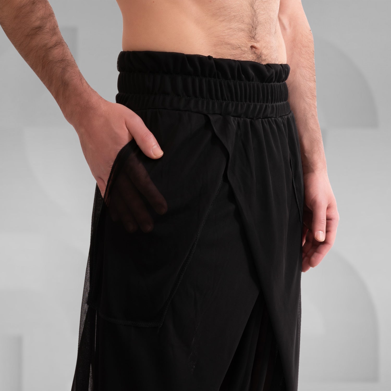 Check out the Avantgarde Mesh Trousers by This is Fred. These trousers redefine clubwear with their innovative design and breathable mesh fabric, ensuring both style and comfort. Perfect for festivals, techno parties, or making a statement on the streets, they bring bold, high-fashion energy to any look. Elevate your style and embrace the avant-garde with these eye-catching trousers.