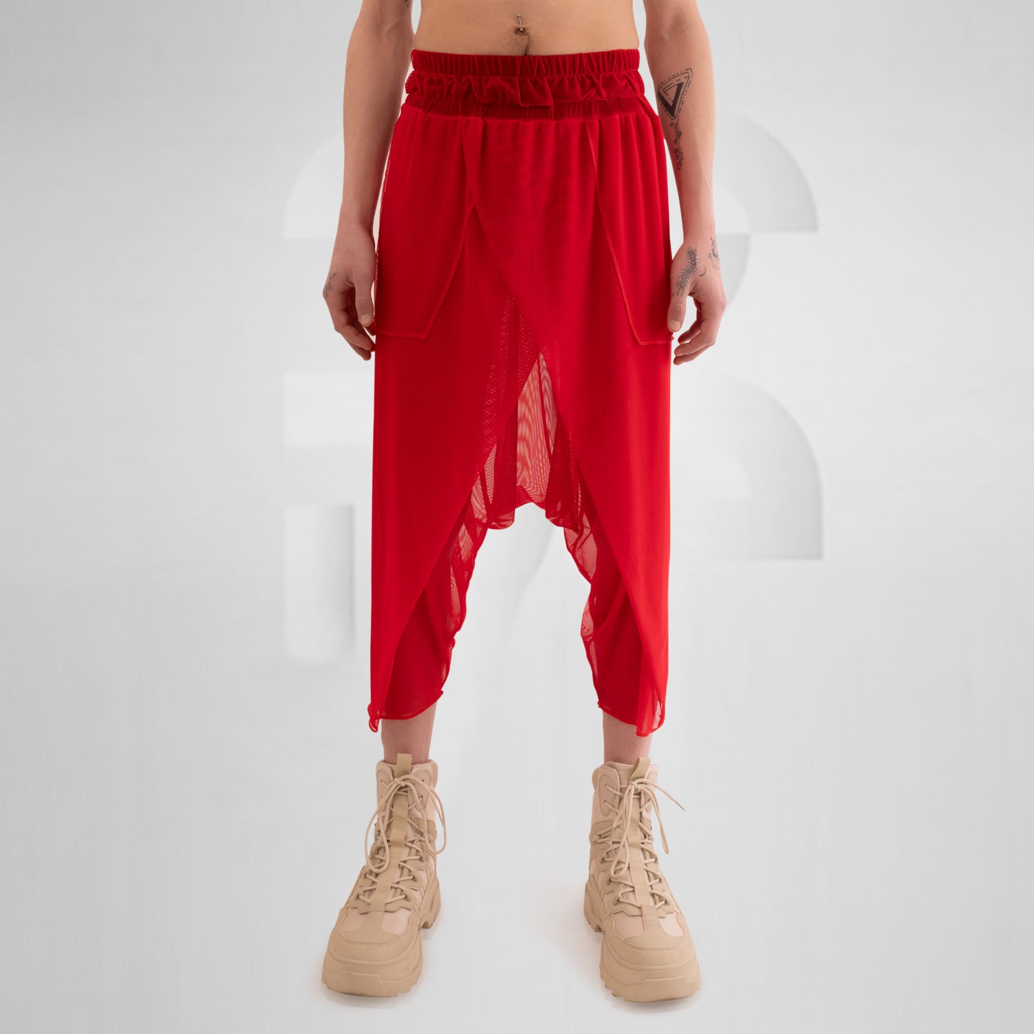 Check out the Avantgarde Mesh Trousers by This is Fred. These trousers redefine clubwear with their innovative design and breathable mesh fabric, ensuring both style and comfort. Perfect for festivals, techno parties, or making a statement on the streets, they bring bold, high-fashion energy to any look. Elevate your style and embrace the avant-garde with these eye-catching trousers.