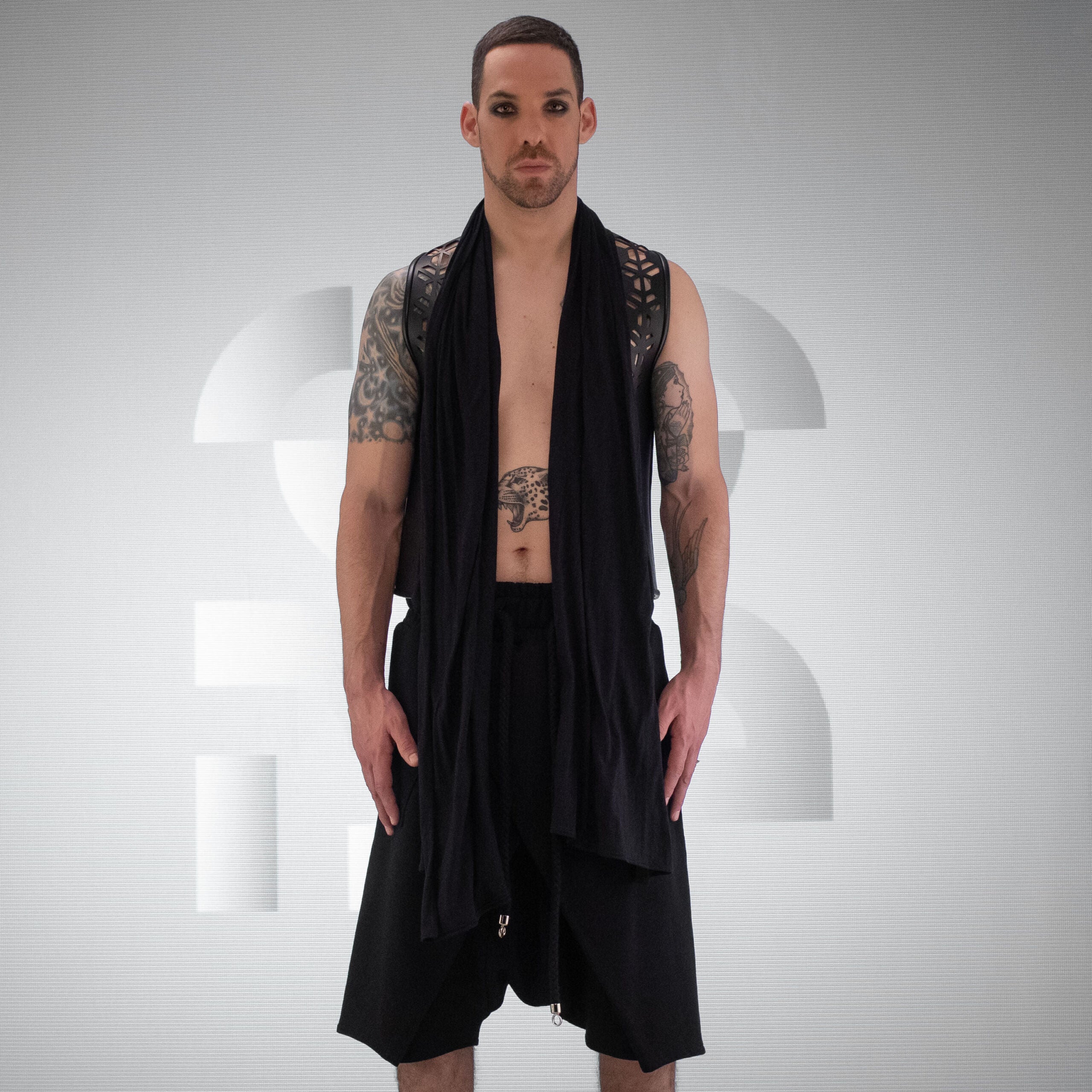 Innovative vegan leather jersey vest crafted out of premium materials with hidden pockets.