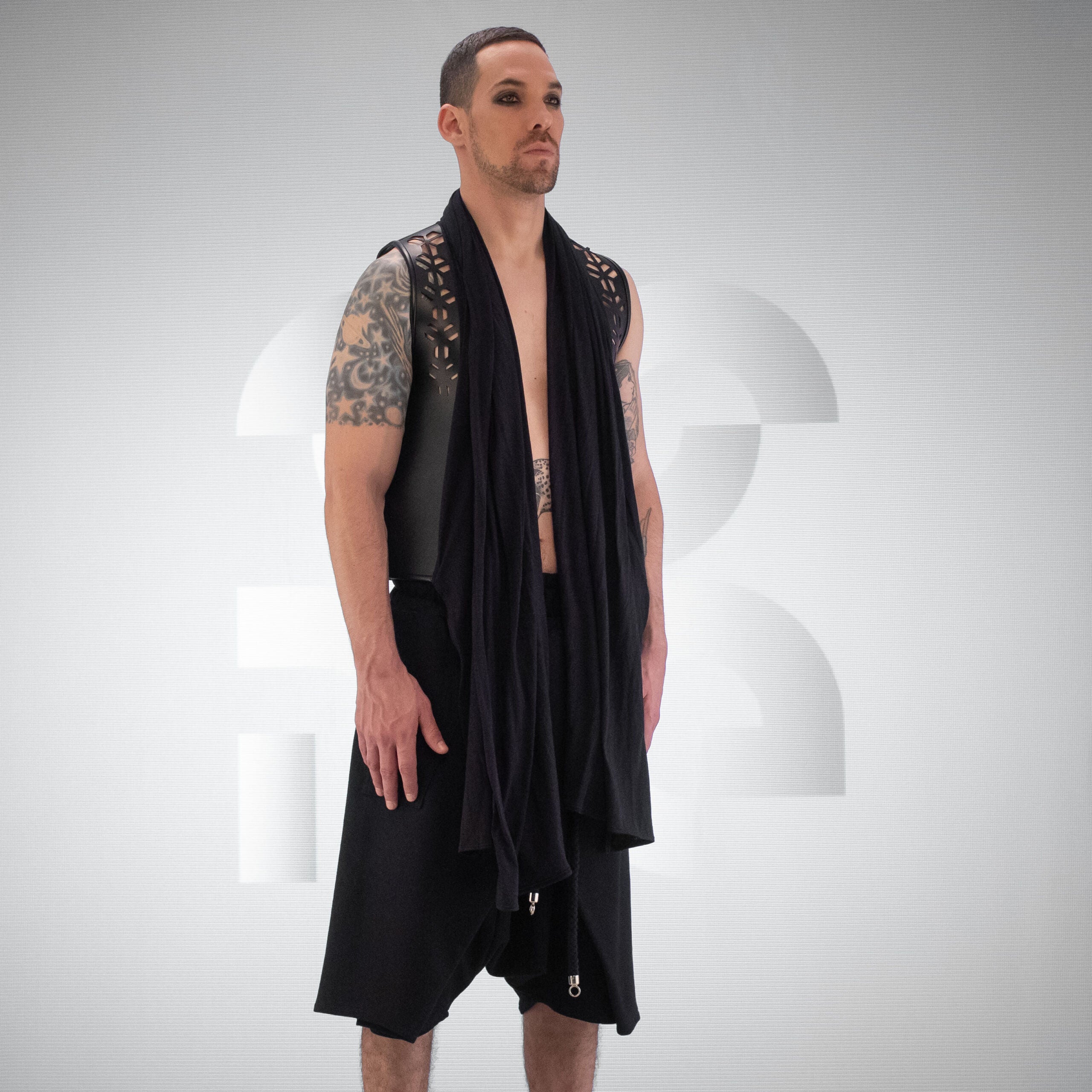 Innovative faux leather jersey vest crafted out of premium materials with hidden pockets.