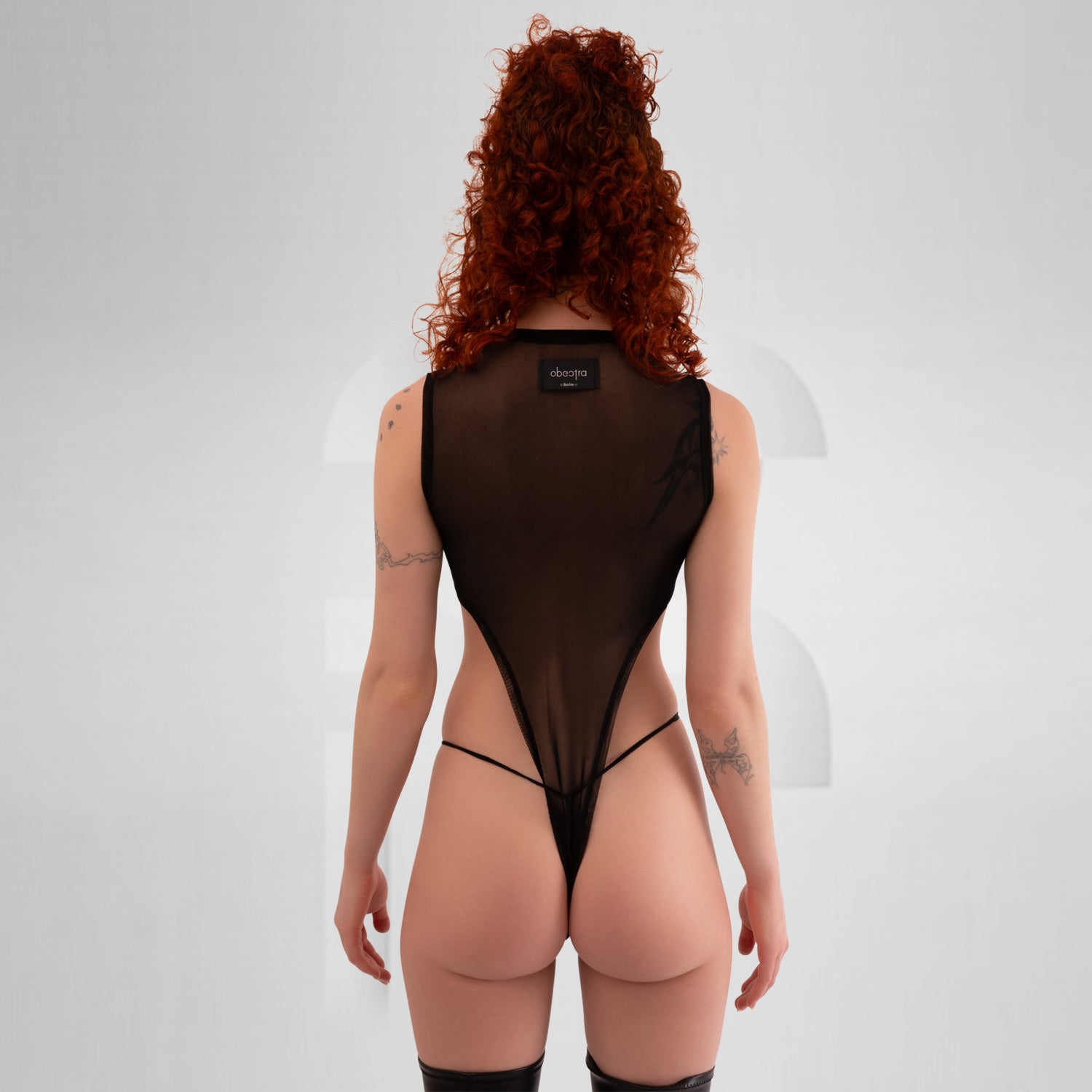 Transparent mesh body, ideal for Berlin Party nights.