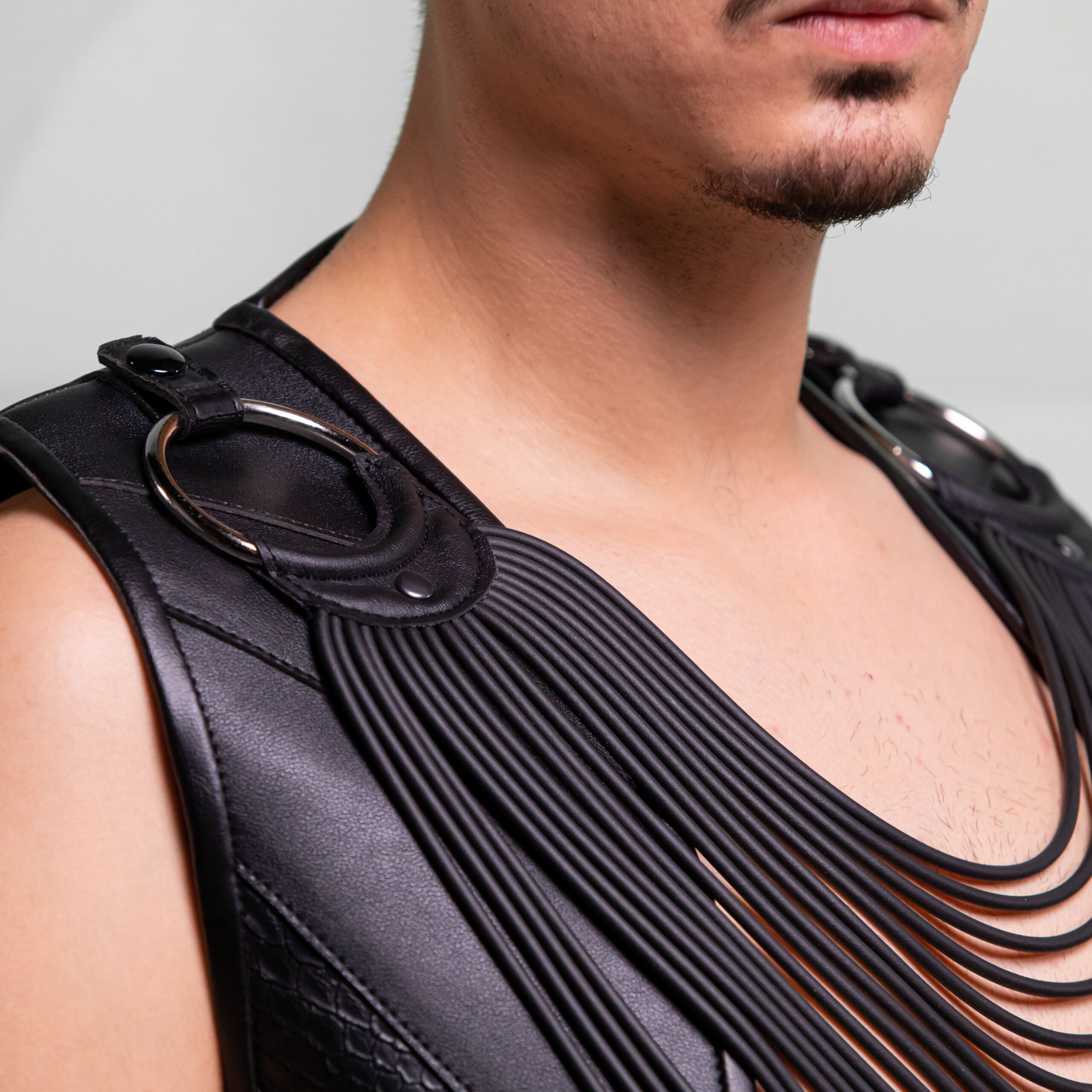Enigmatic Harness Top with Ring Detail, made of vegan leather.