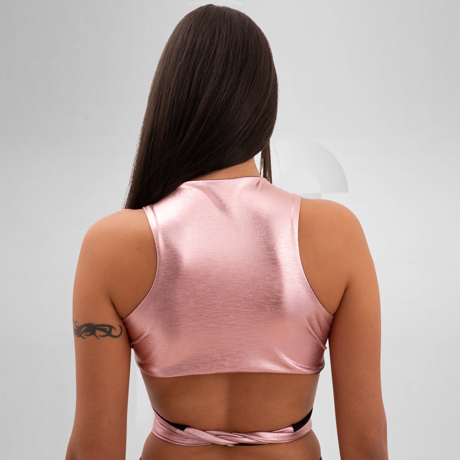 Introducing the Bound Gender-Neutral Foil Top from Berlin designer Nur Hektor. This avant-garde piece features eye-catching foil accents and a bold, wraparound design, making it ideal for festivals and clubwear. Perfect for expressing individuality and embracing a kinky, edgy style, this top captures the essence of Berlin's cutting-edge fashion. Elevate your look and stand out with this unique statement piece!