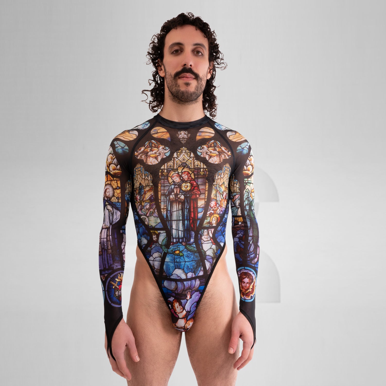 Front view of the artsy yet edgy Church Print Bodysuit with long sleeves and a thong by Effenberger Couture.
