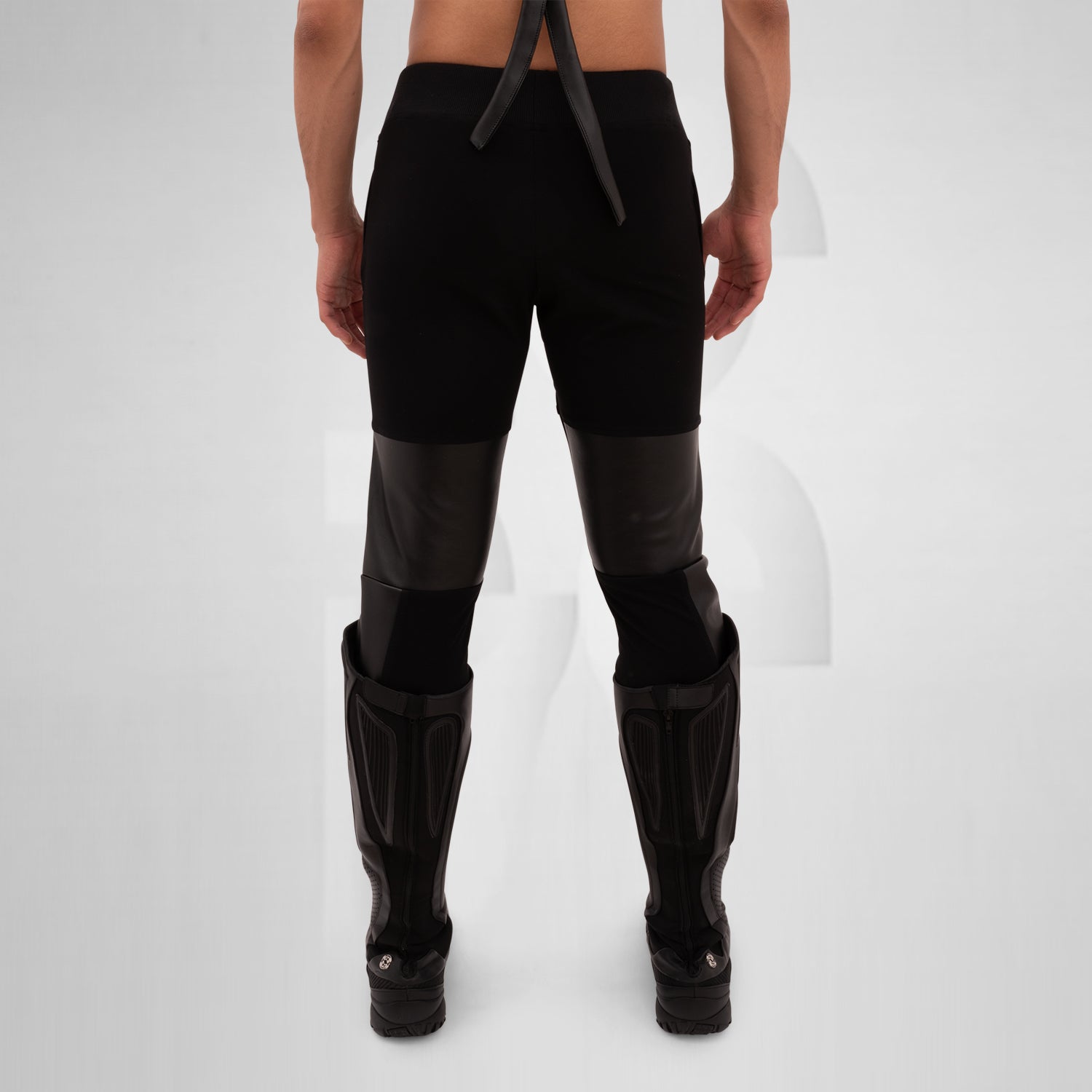The Faux Leather Laser-Cut Jogger Pants feature a unique design that seamlessly blends comfort with edgy style. CEquipped with a drawstring waist for an adjustable fit, they provide both functionality and flair. The jogger style also includes practical side patch pockets, making them perfect for any on-the-go lifestyle. Ideal for fashion-forward individual