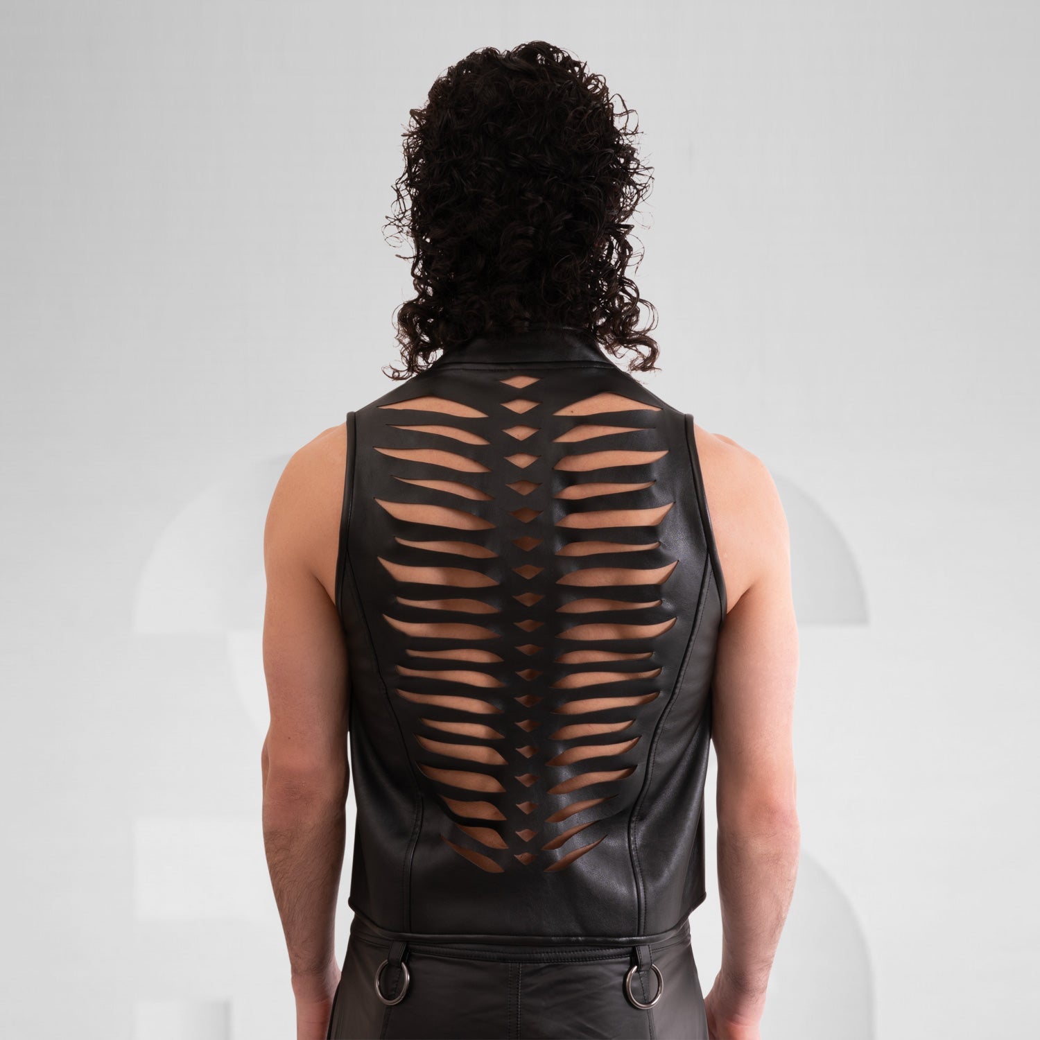 Faux Leather Vest with Center Front Zipper and Laser Cut Detail at the Back