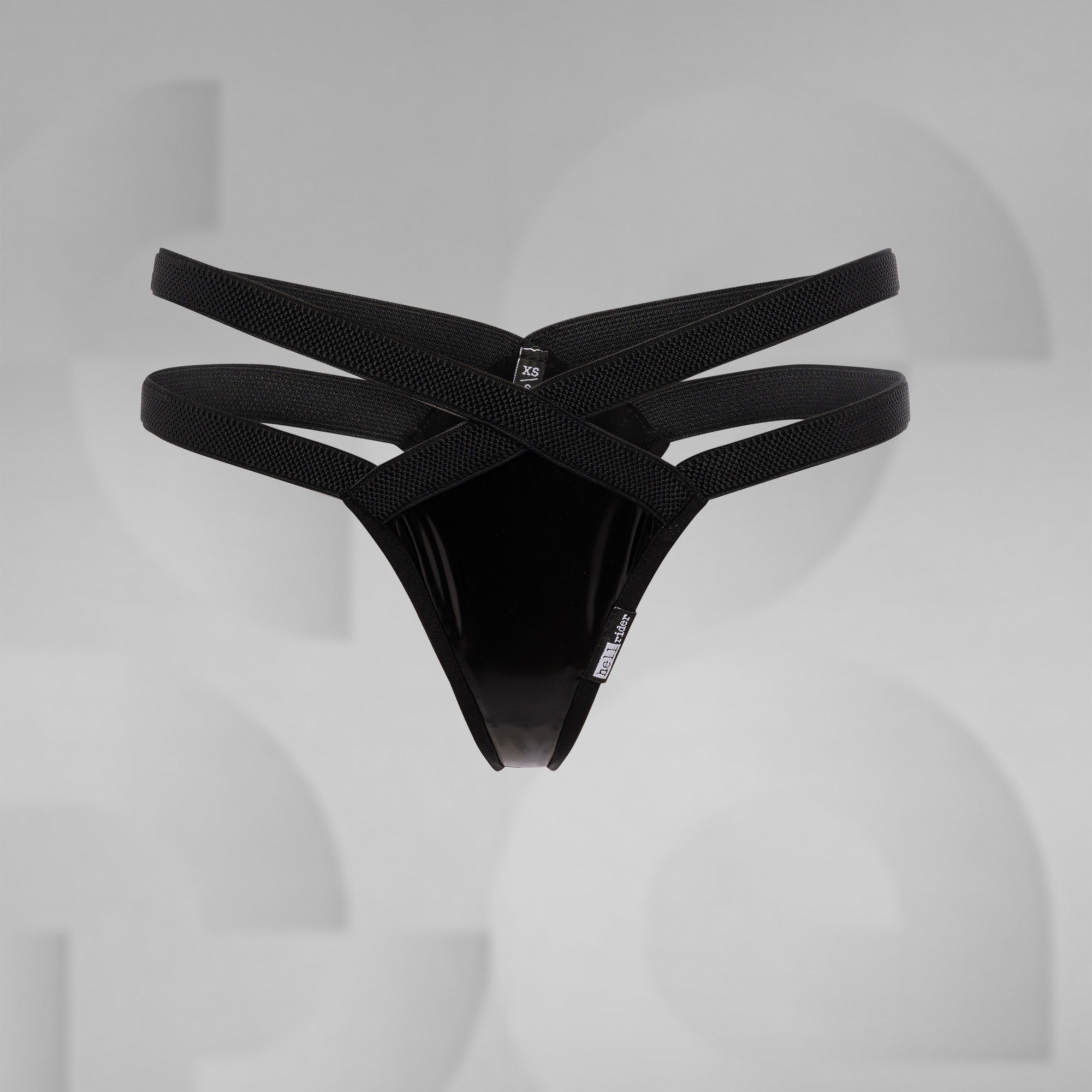 Black men's underwear on a mannequin against a gray background