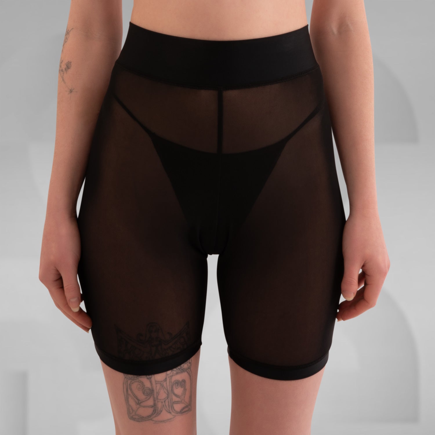 Styl black and white biker mesh shorts designed for ultimate comfort, perfect for summer parties or hot days in Berlin. The breathable fabric ensures a cool fit, making them an ideal addition to your summer wardrobe.