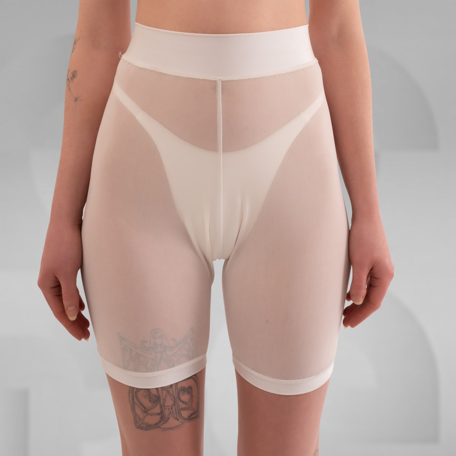 Styl black and white biker mesh shorts designed for ultimate comfort, perfect for summer parties or hot days in Berlin. The breathable fabric ensures a cool fit, making them an ideal addition to your summer wardrobe.