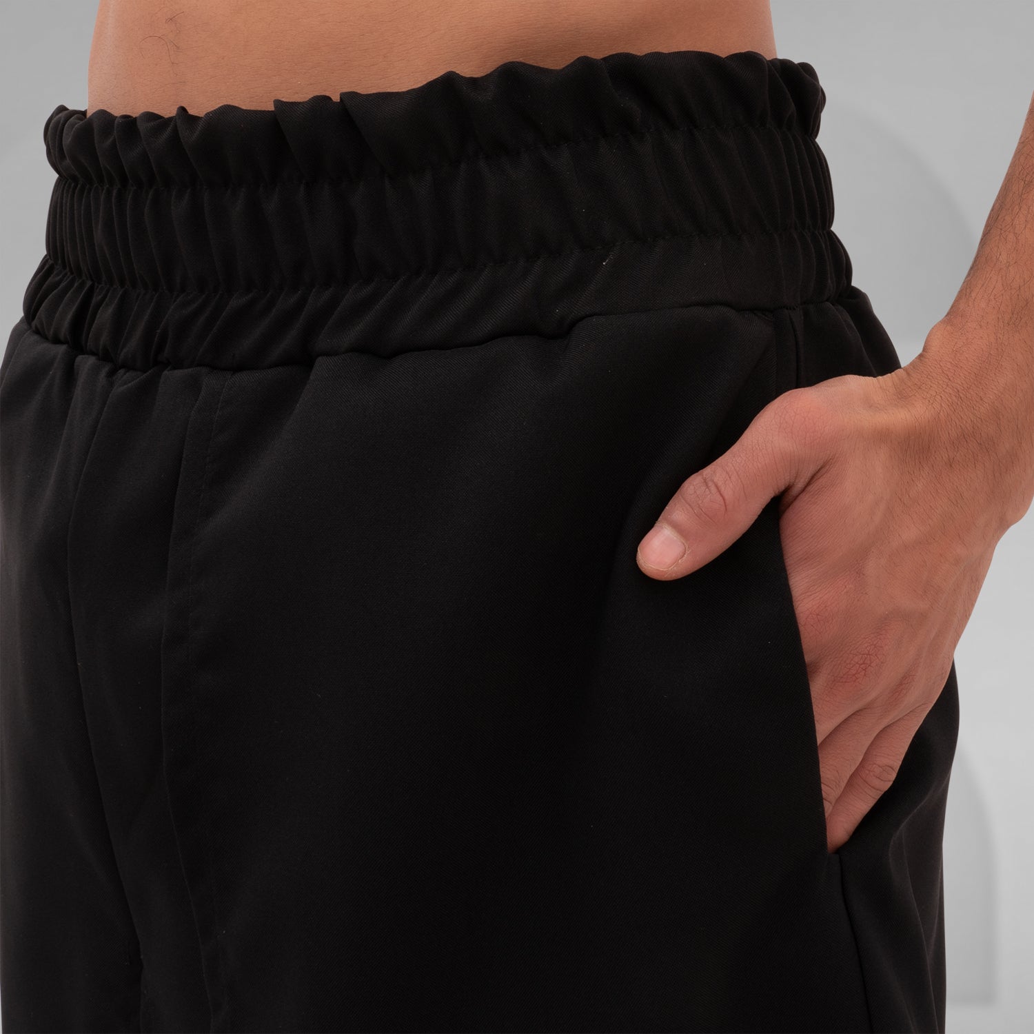 The Layered Bootcut Shorts Mixed from This is Fred present a striking silhouette that embodies contemporary fashion innovation. With a unique layered design in sleek black, these shorts offer a perfect blend of style and comfort, making them versatile for both energetic dance floors and stylish outings. The elasticated waistband ensures a comfortable fit, while the bootcut style adds a modern edge.