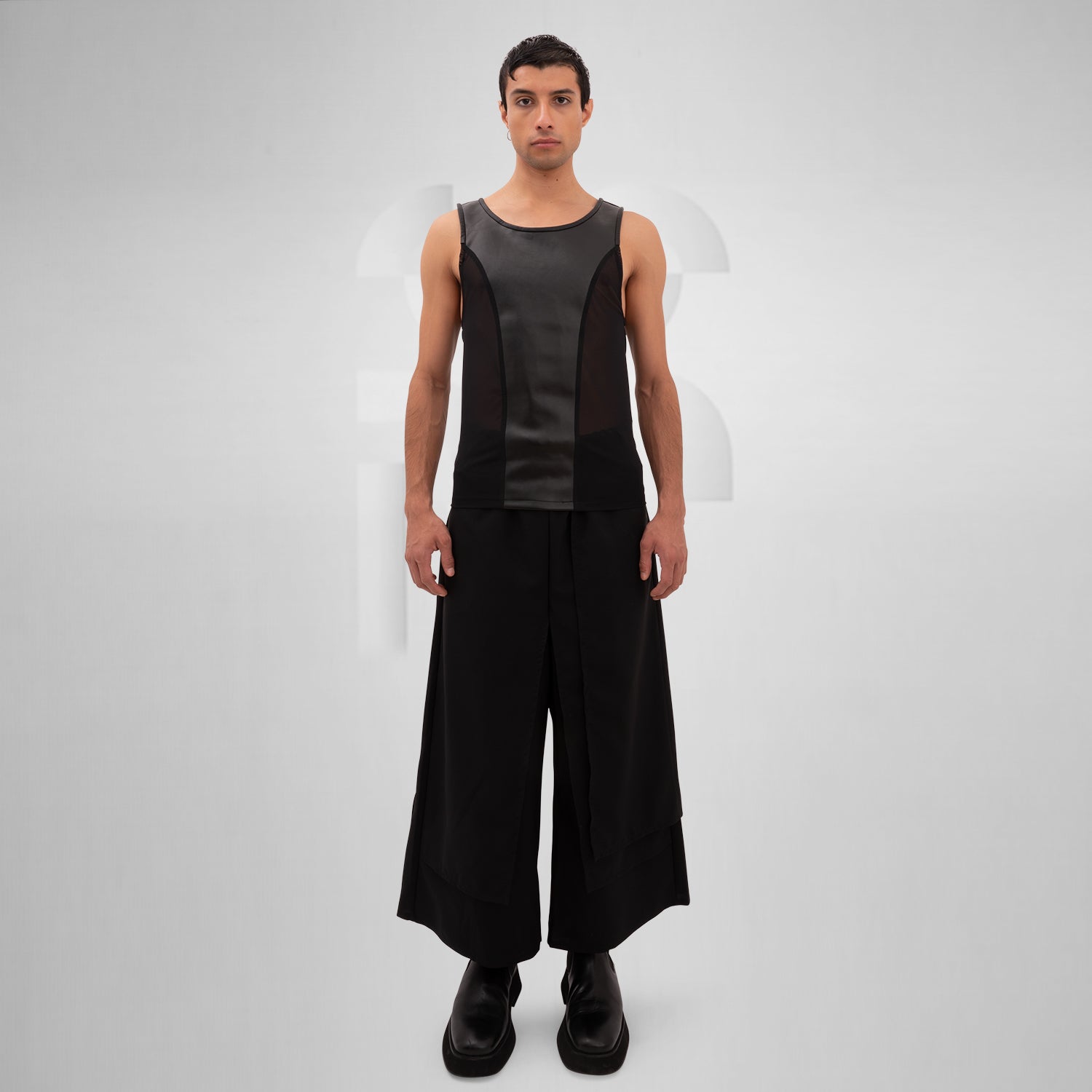 The Layered Bootcut Trousers Mixed from This is Fred showcase a unique design that embodies contemporary London fashion. Featuring a distinctive layered silhouette, these trousers offer a stylish twist to the classic bootcut, making them perfect for both vibrant dance floors and urban street settings. The comfortable fit and sleek black fabric ensure versatility and ease of movement, allowing you to express your individuality effortlessly. Pair them with your favorite boots for a bold, fashion-forward state