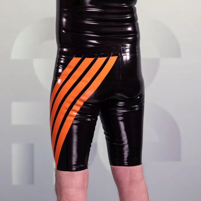 The image showcases striking black shorts with bold orange stripes from HeavyTool Gear. Crafted from glossy latex, these shorts provide a sleek, form-fitting silhouette that perfectly highlights your physique. The eye-catching design adds a sporty edge, making them ideal for both clubwear and edgy street fashion, ensuring you stand out no matter the occasion.