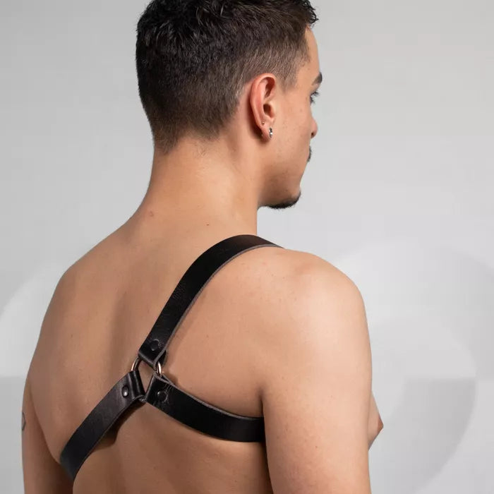 Sleek unisex black leather shoulder harness made from durable cowhide, serving your bold style statement.