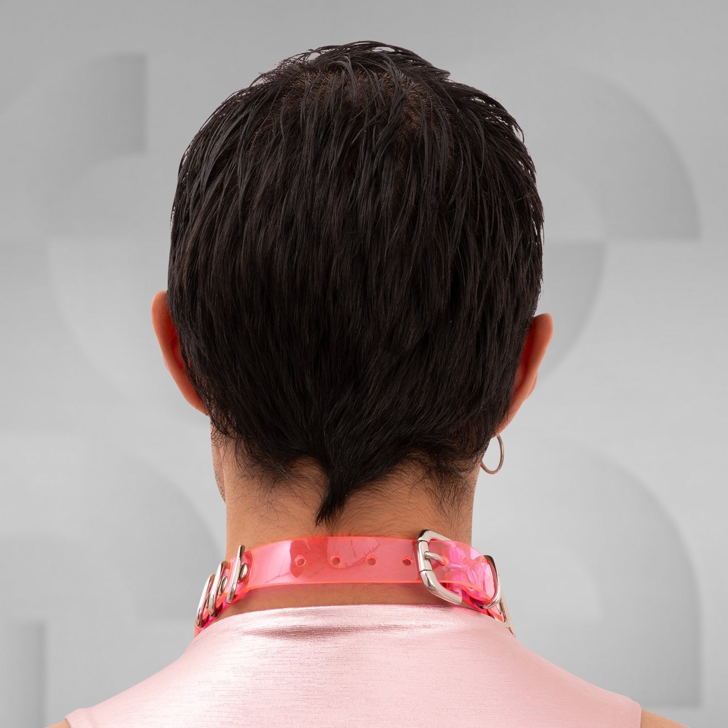 The Pink Chain PVC Choker from Broke Boutique is a striking accessory that combines bold metallic links with vibrant pink PVC accents. Designed to stand out, this choker adds a unique edge to any outfit, making it perfect for nightlife and clubwear. Its chunky design not only enhances your look but also embodies the playful, avant-garde spirit of contemporary fashion. Whether you're hitting a festival or a night out, this choker is an essential statement piece.