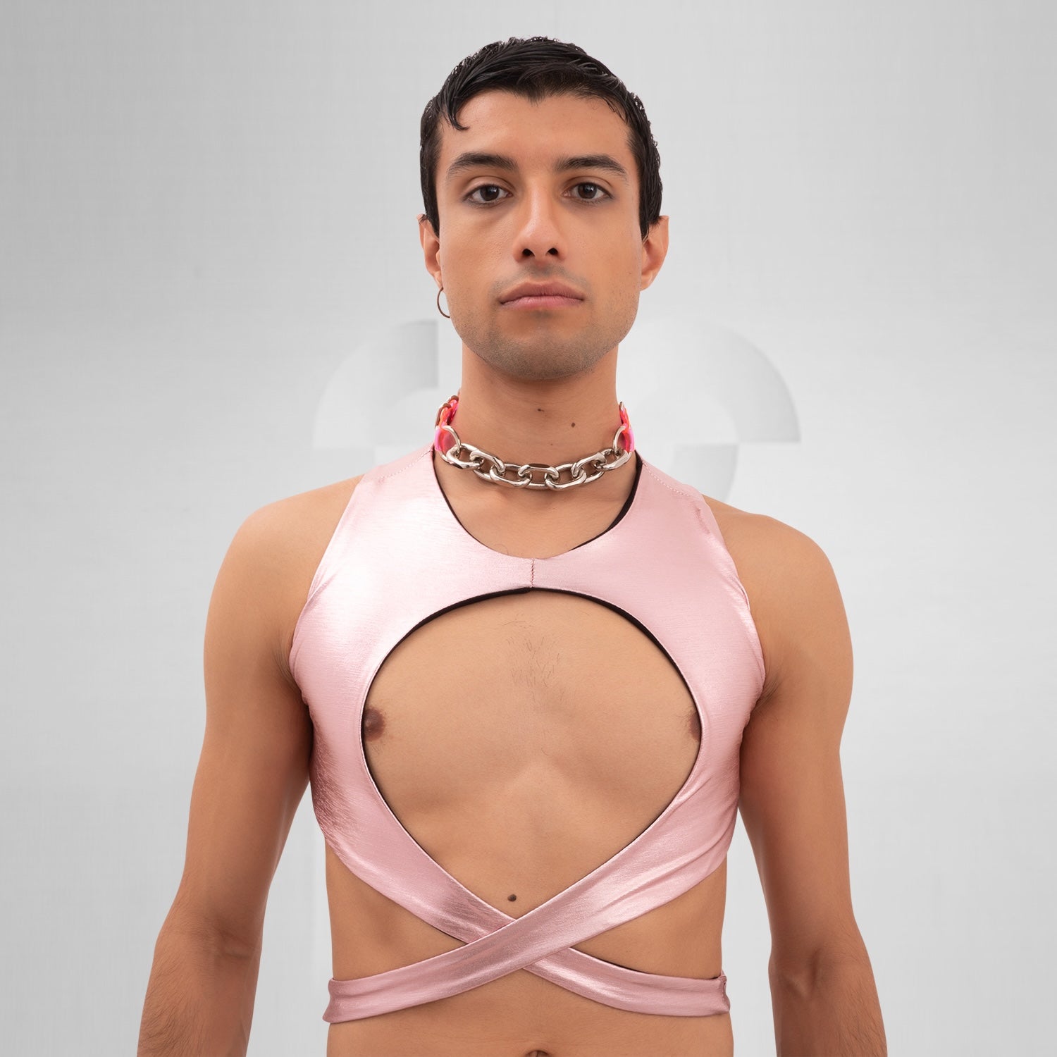 The Pink Chain PVC Choker from Broke Boutique is a striking accessory that combines bold metallic links with vibrant pink PVC accents. Designed to stand out, this choker adds a unique edge to any outfit, making it perfect for nightlife and clubwear. Its chunky design not only enhances your look but also embodies the playful, avant-garde spirit of contemporary fashion. Whether you're hitting a festival or a night out, this choker is an essential statement piece.