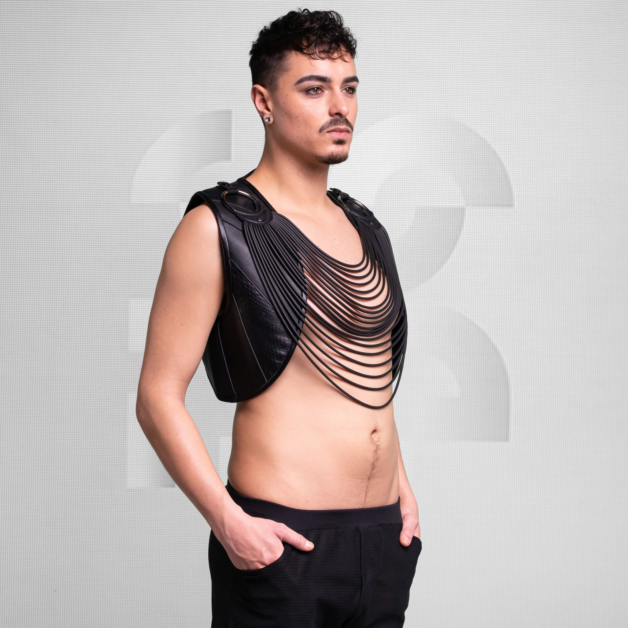 Enigmatic Vest with Rubber Detail, made of Faux leather.