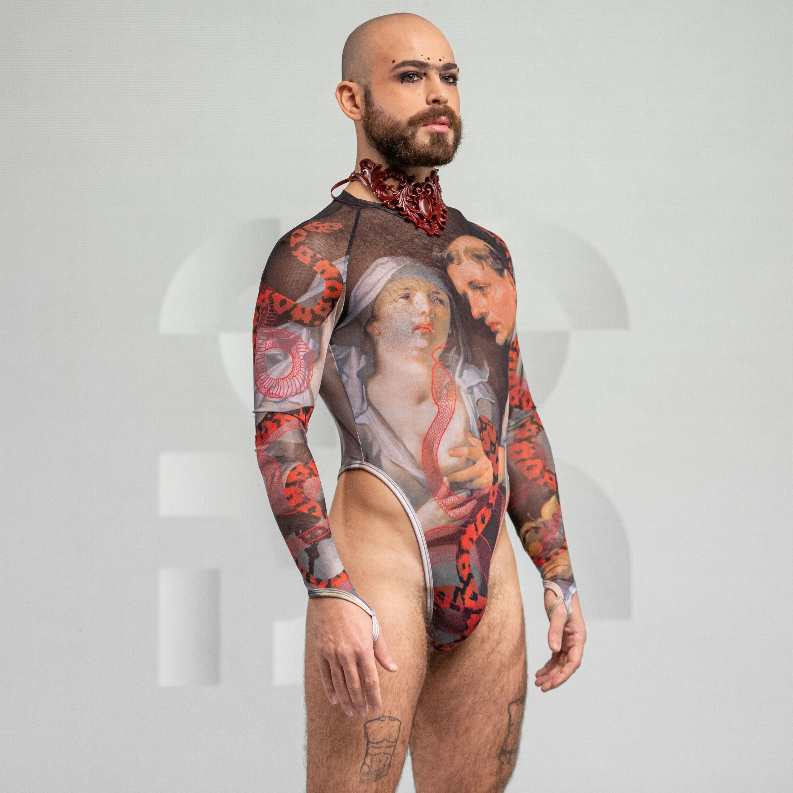 Side view of the artsy yet edgy Serpent Print Bodysuit with long sleeves and a thong by Effenberger Couture.