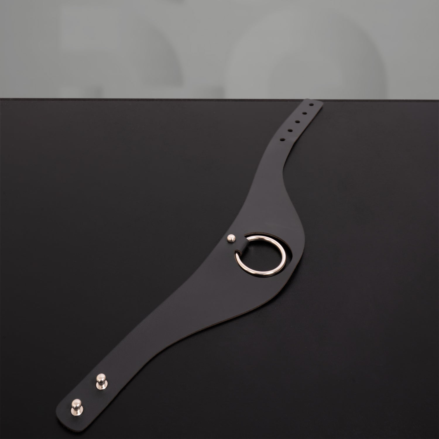 Stunning black faux leather choker with modern design.