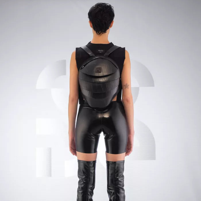 The faux Leather Anti-Spy Backpack - crafted from 100% recycled rubber, featuring a waterproof zipper, anti-spy pocket, and secret compartment.