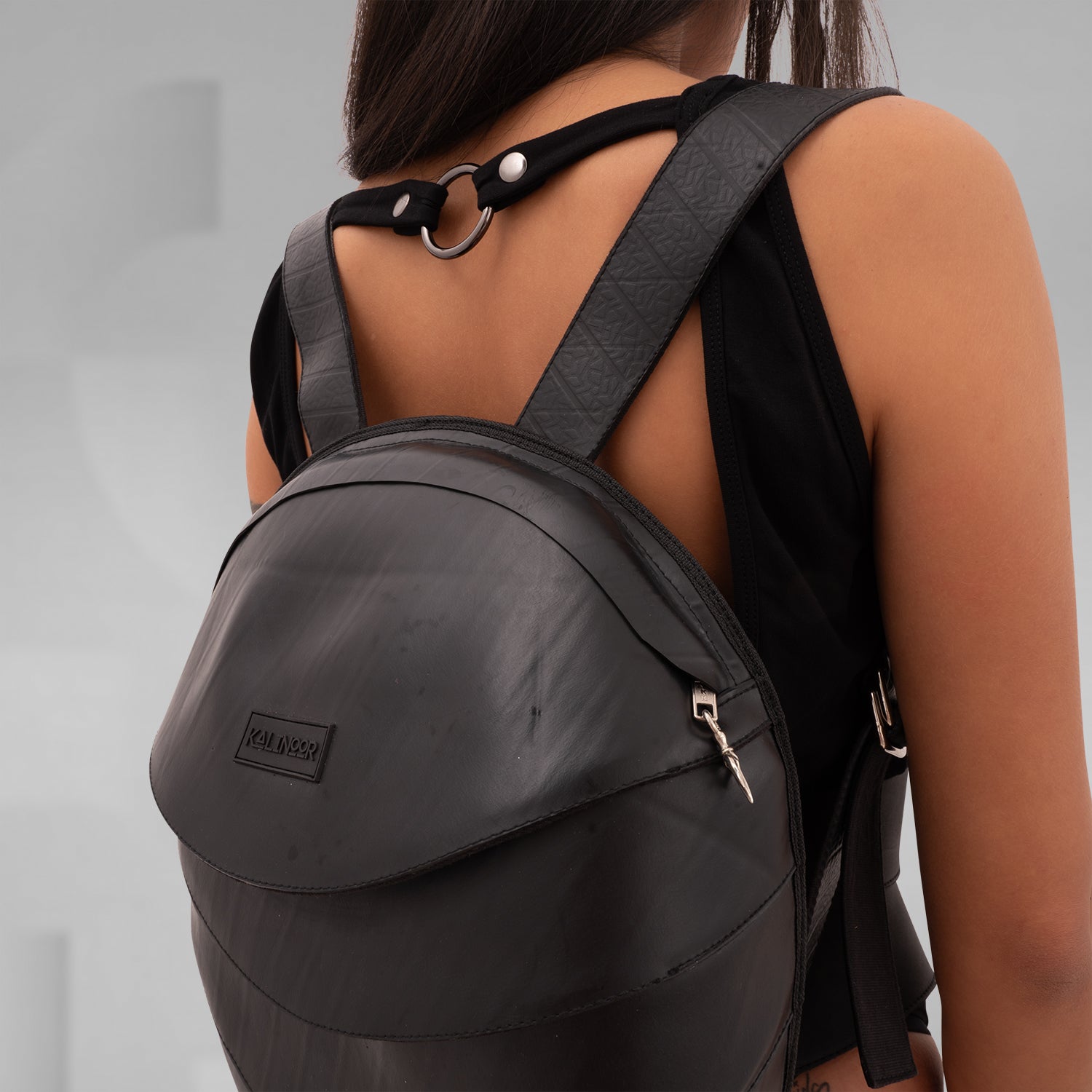 The faux Leather Anti-Spy Backpack - crafted from 100% recycled rubber, featuring a waterproof zipper, anti-spy pocket, and secret compartment.