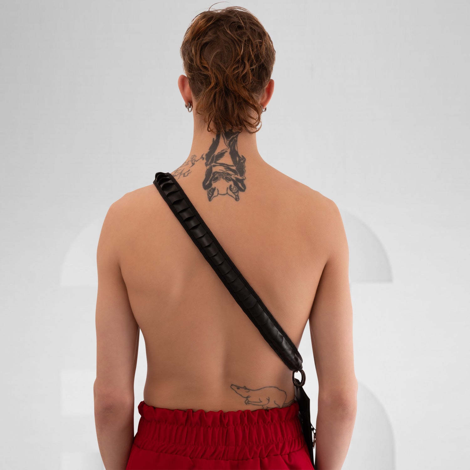 Faux Leather Phone Pocket by Kalinoor – crafted from cruelty-free faux leather with a secure inside pocket for small essentials.