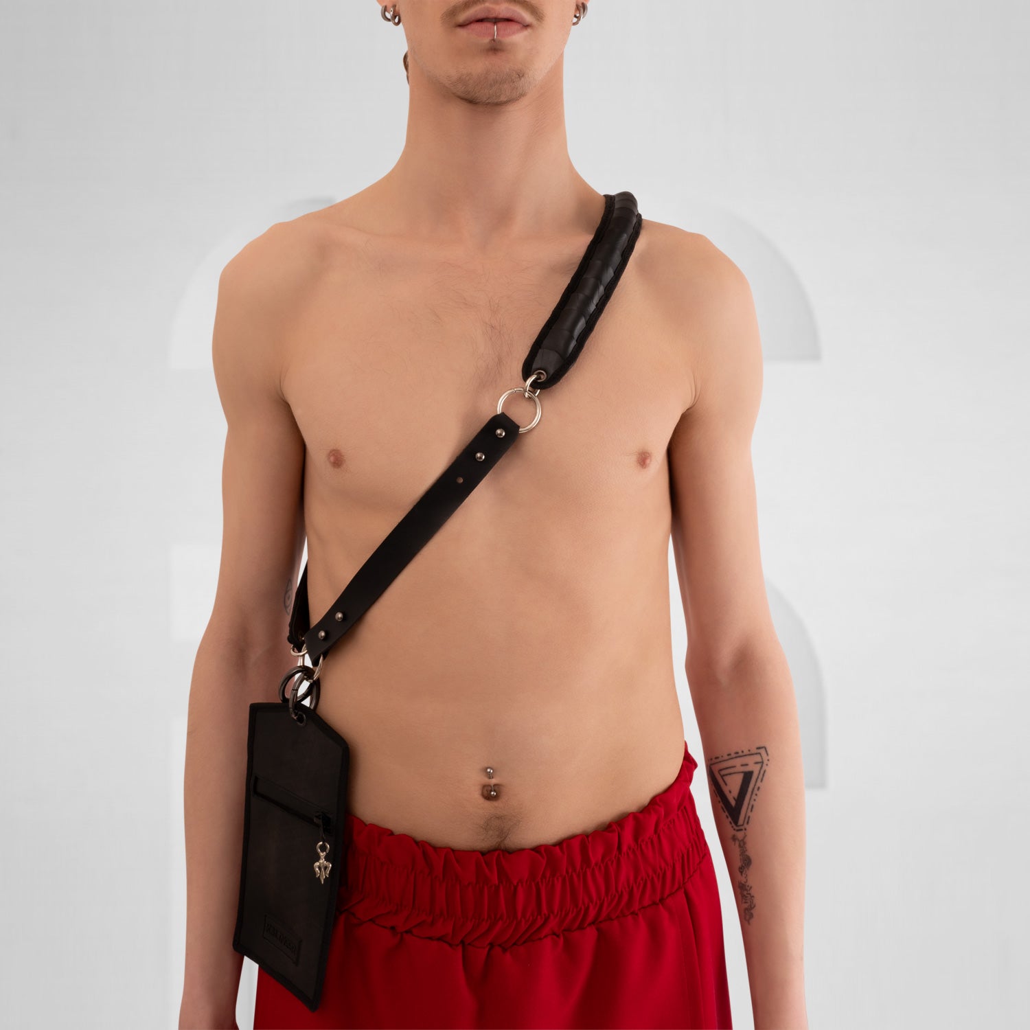 Faux Leather Phone Pocket by Kalinoor – crafted from cruelty-free faux leather with a secure inside pocket for small essentials.