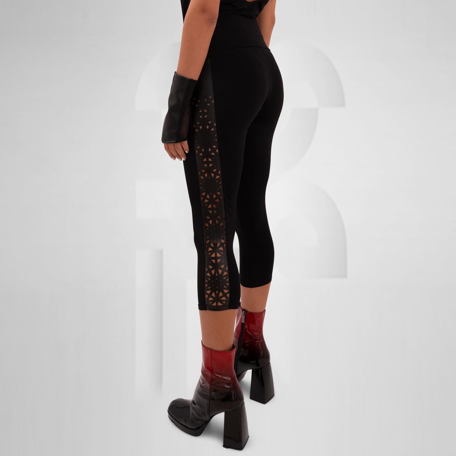 Cotton leggings featuring a vegan laser-cut panel with a psychedelic pattern, designed for bold self-expression and perfect for festivals, nightlife, and avant-garde outfits.