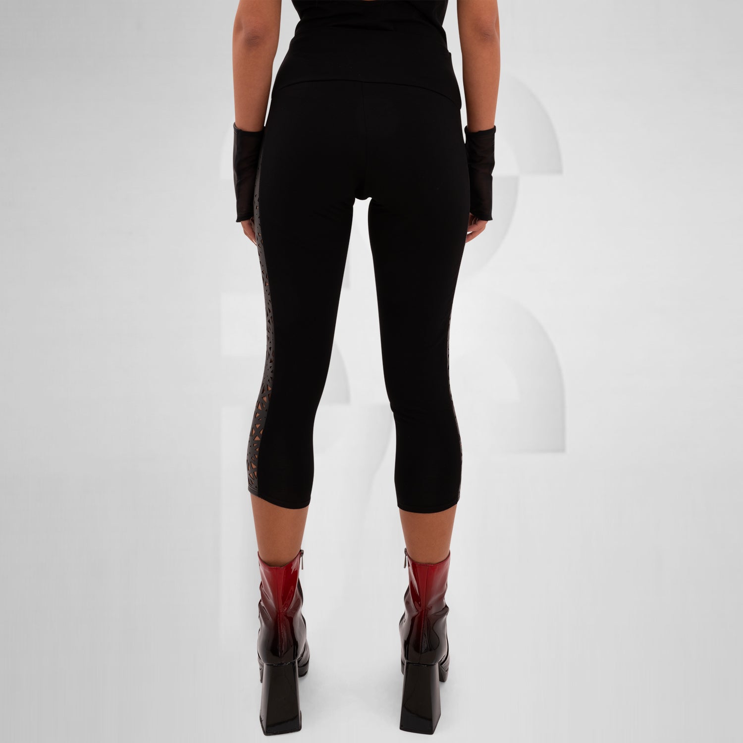 Cotton leggings featuring a vegan laser-cut panel with a psychedelic pattern, designed for bold self-expression and perfect for festivals, nightlife, and avant-garde outfits.