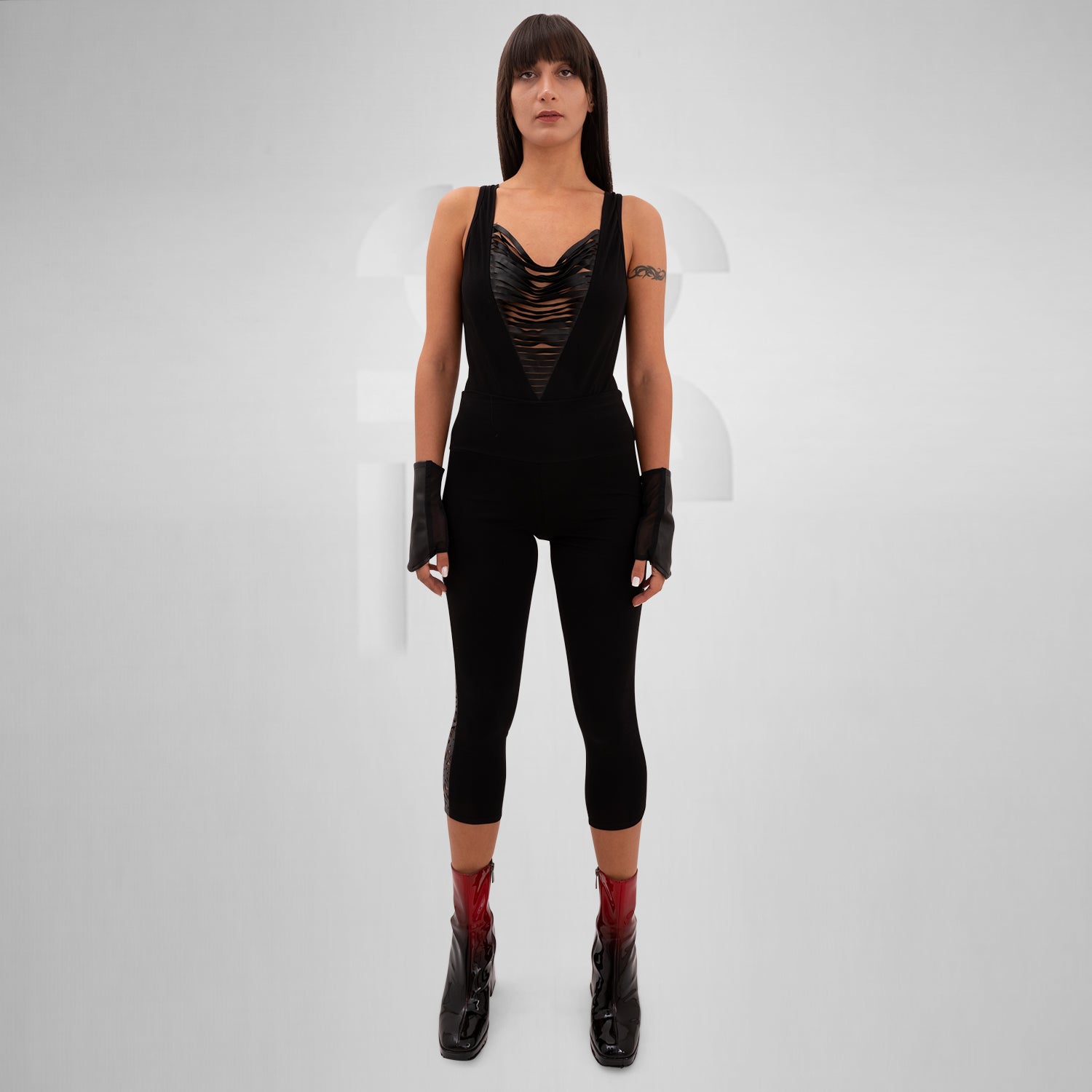 Cotton leggings featuring a vegan laser-cut panel with a psychedelic pattern, designed for bold self-expression and perfect for festivals, nightlife, and avant-garde outfits.