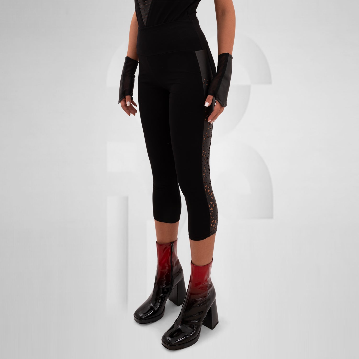 Cotton leggings featuring a vegan laser-cut panel with a psychedelic pattern, designed for bold self-expression and perfect for festivals, nightlife, and avant-garde outfits.