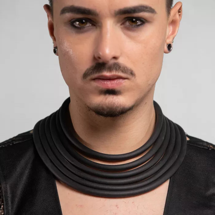 Tribal black collar made out of rubber tubes, bringing back that ancestral vibe.