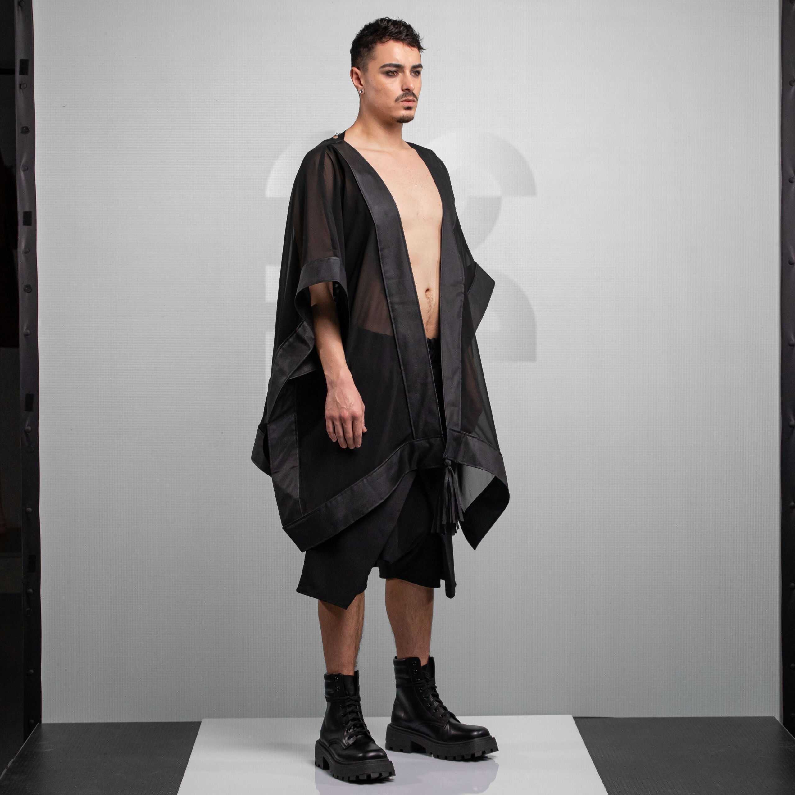 Flowing, ethereal mesh statement kimono.