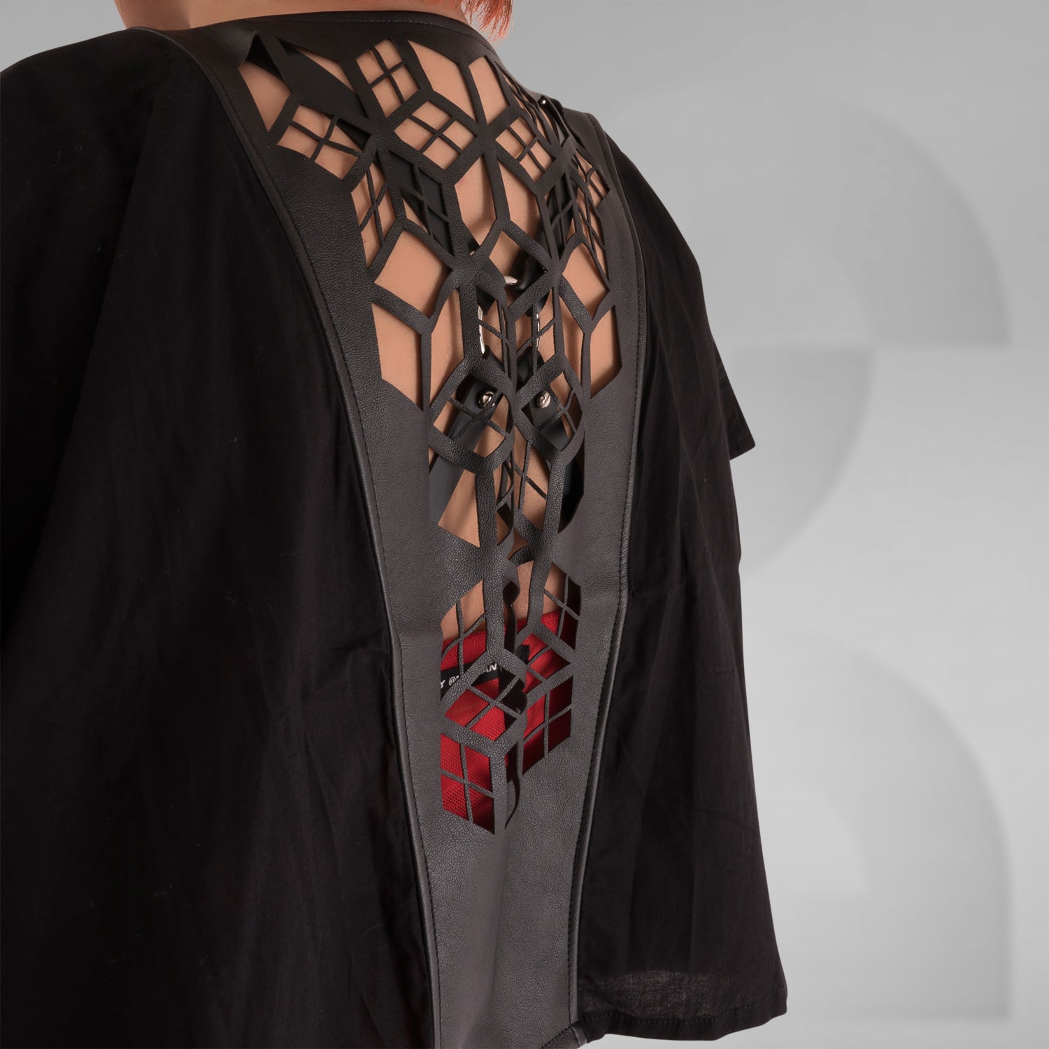 Short black kimono made of cotton and faux leather in Berlin avant-garde fashion