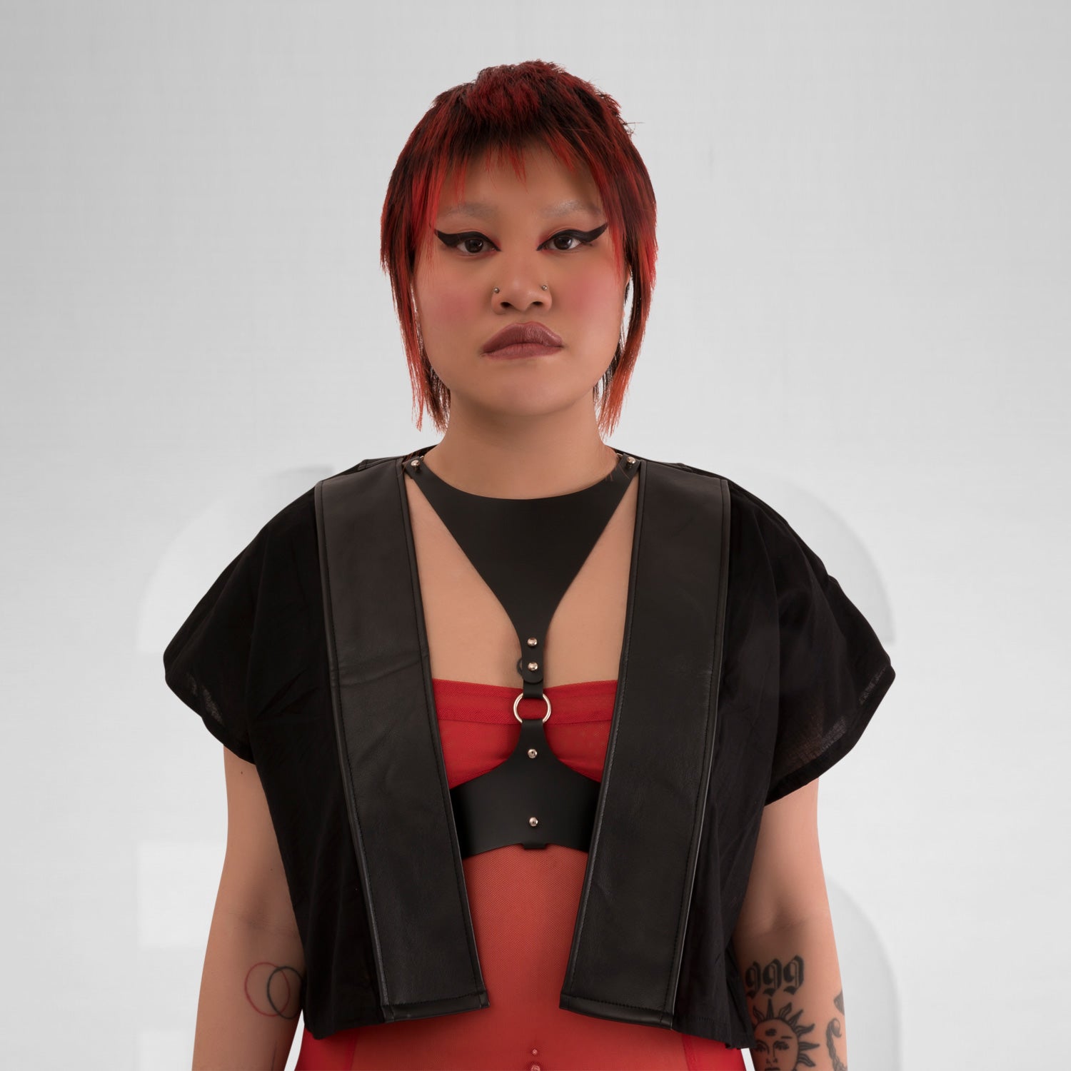 Short black kimono made of cotton and faux leather in Berlin avant-garde fashion