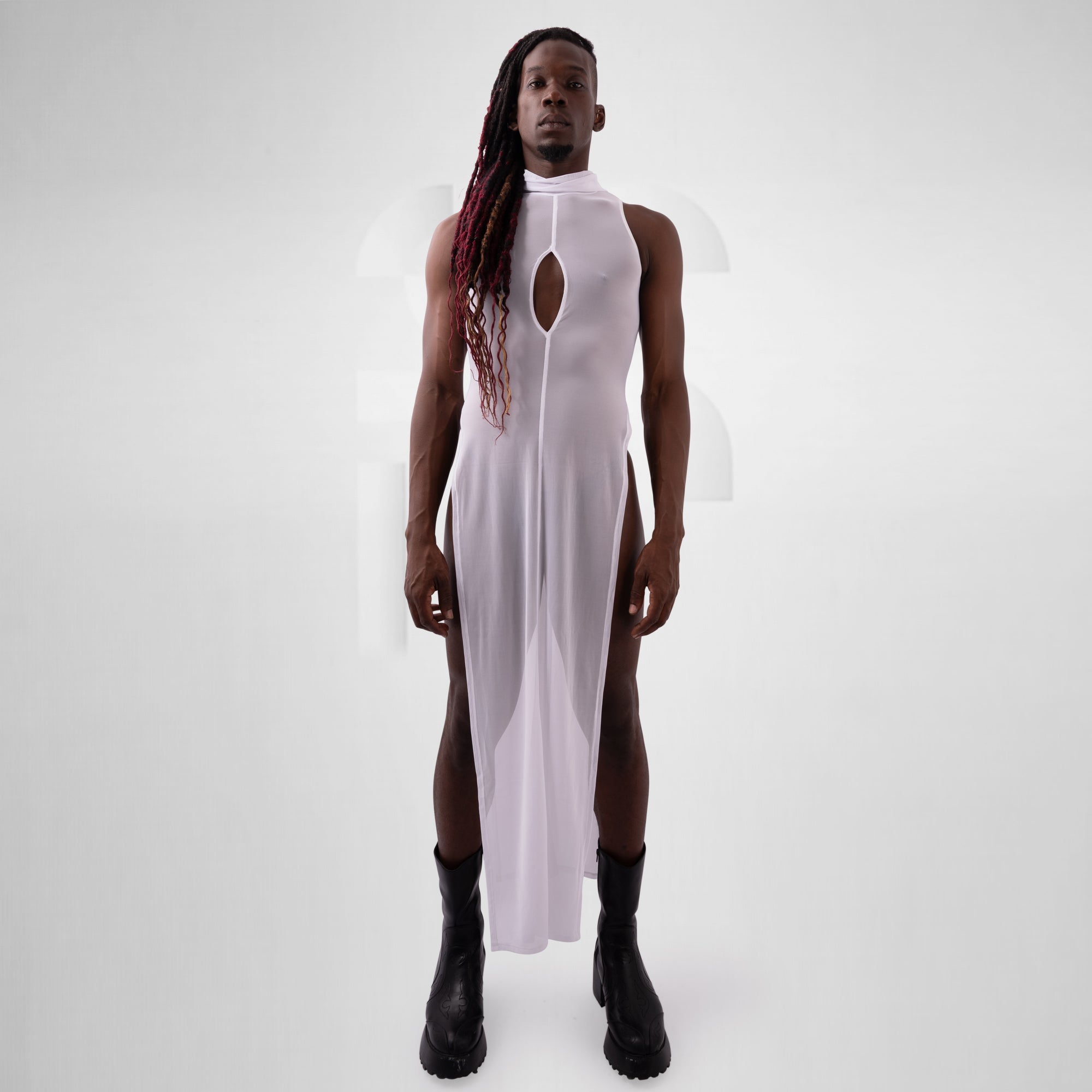Person wearing a white sleeveless dress with cut-out design on a white background