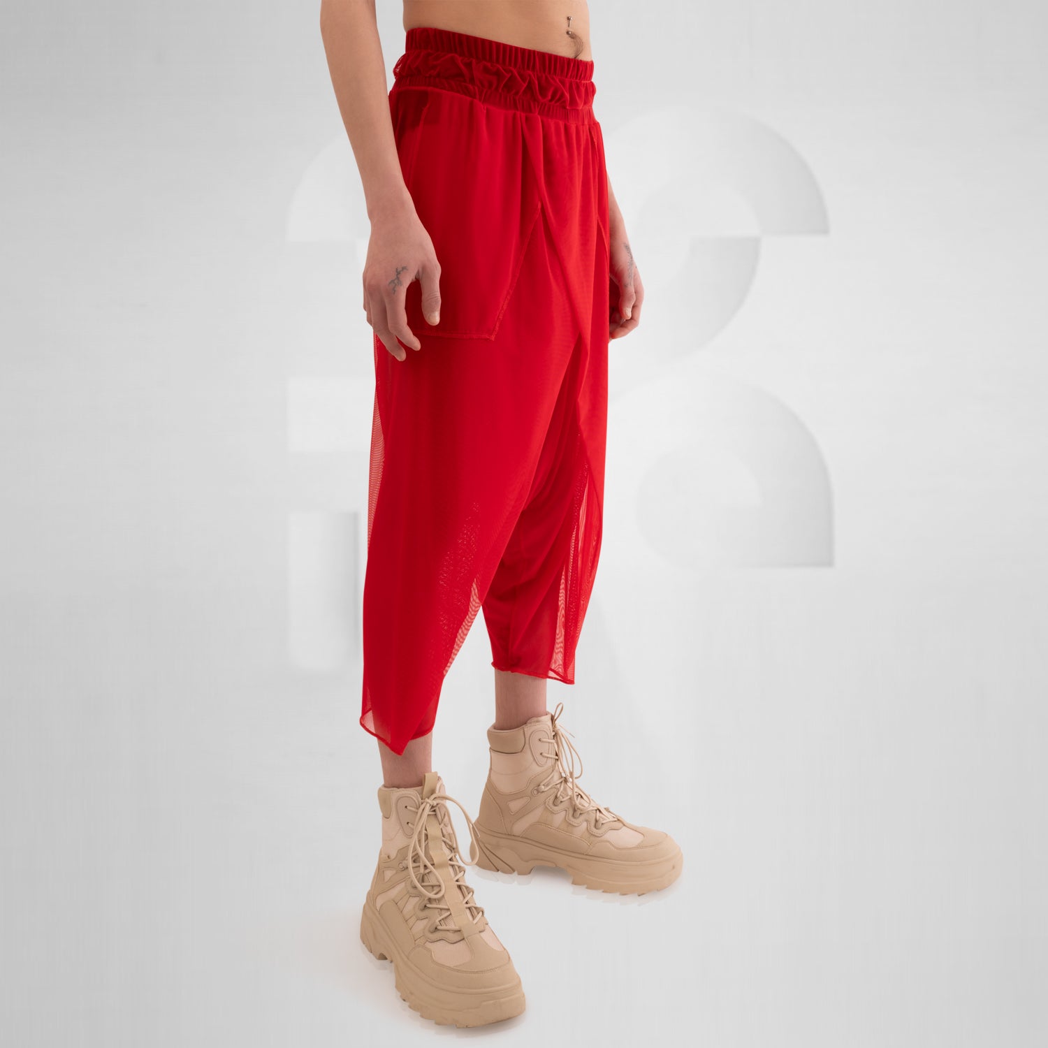 Check out the Avantgarde Mesh Trousers by This is Fred. These trousers redefine clubwear with their innovative design and breathable mesh fabric, ensuring both style and comfort. Perfect for festivals, techno parties, or making a statement on the streets, they bring bold, high-fashion energy to any look. Elevate your style and embrace the avant-garde with these eye-catching trousers.