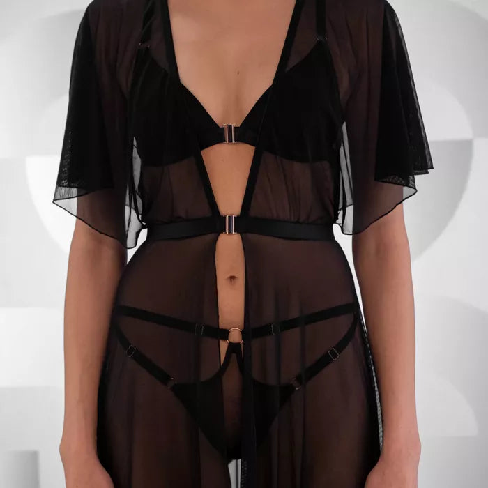 Detail of the flowing black sheer robe in a long cut, perfect for claiming the night's effortless elegance.