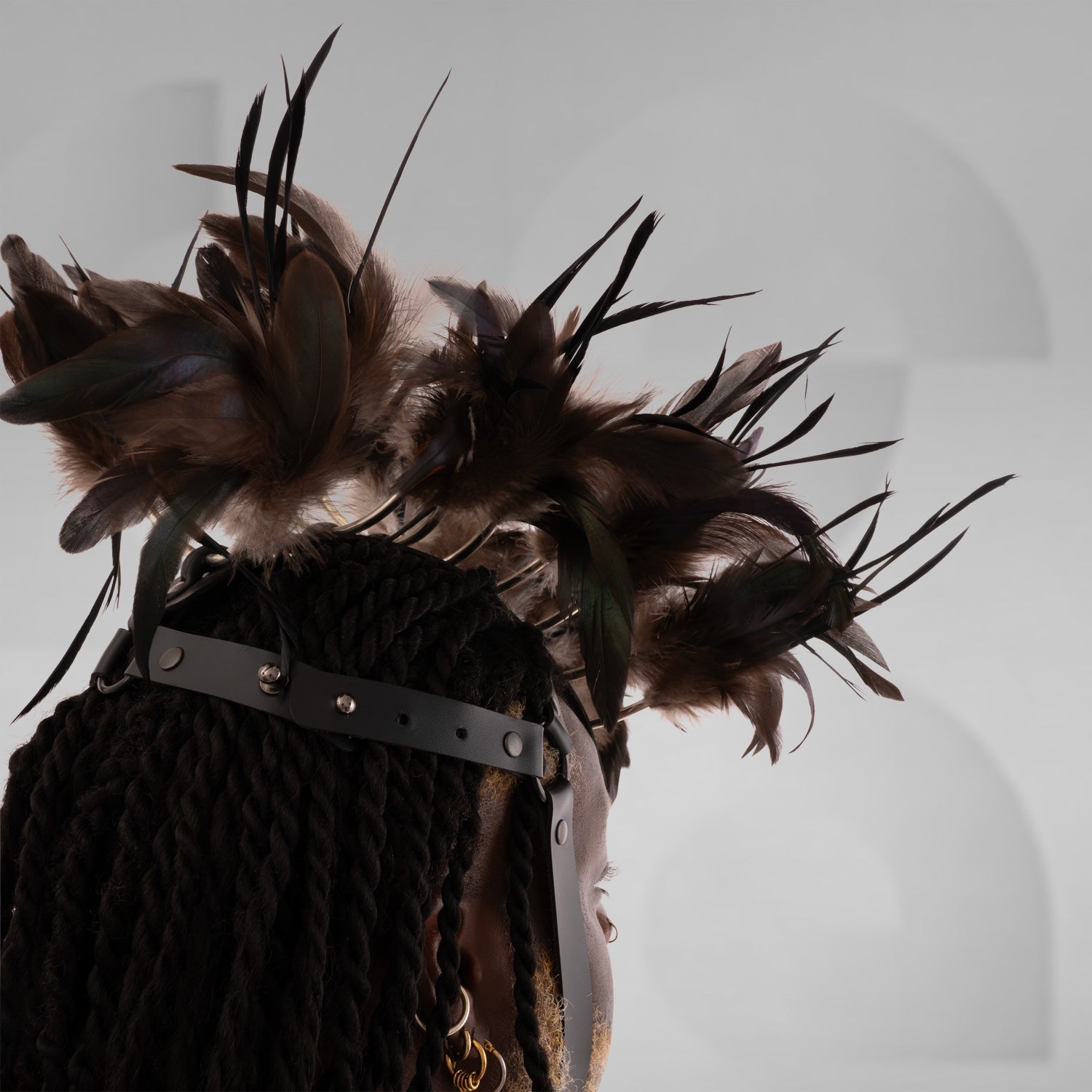 A stunning feather headpiece, a symbol of the electro music scene, adding glamour and charm to any performer's ensemble.