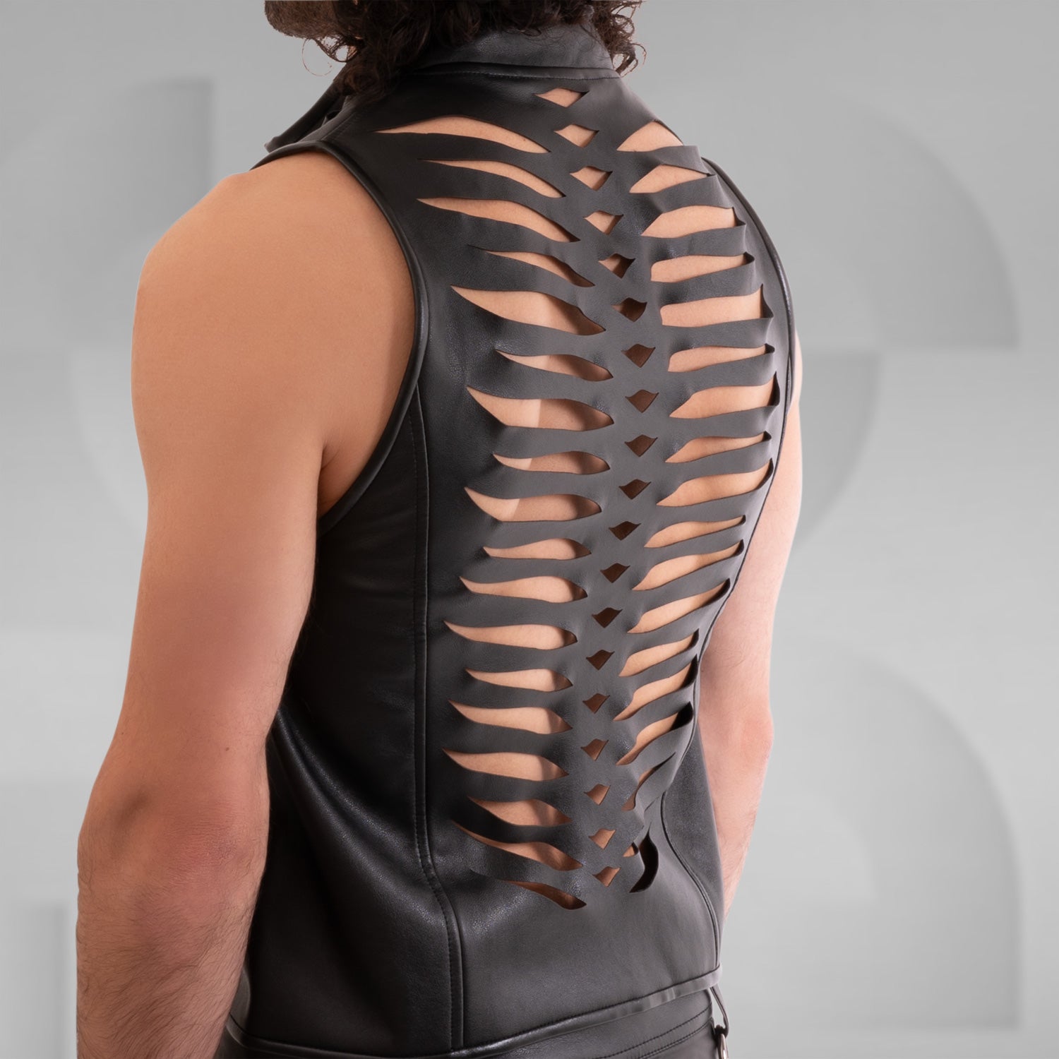 Faux Leather Vest with Center Front Zipper and Laser Cut Detail at the Back