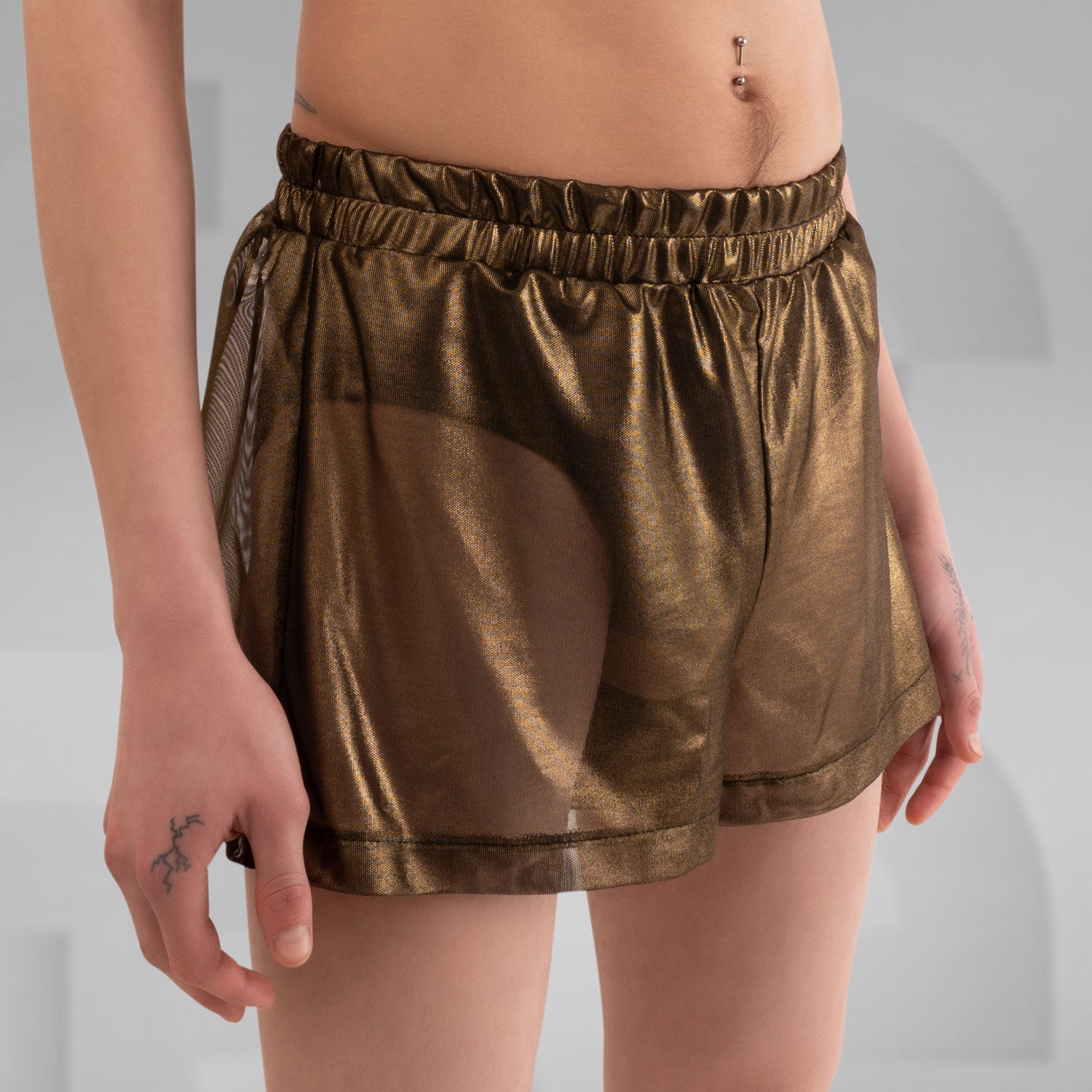 Metallic shorts with disco festival vibe