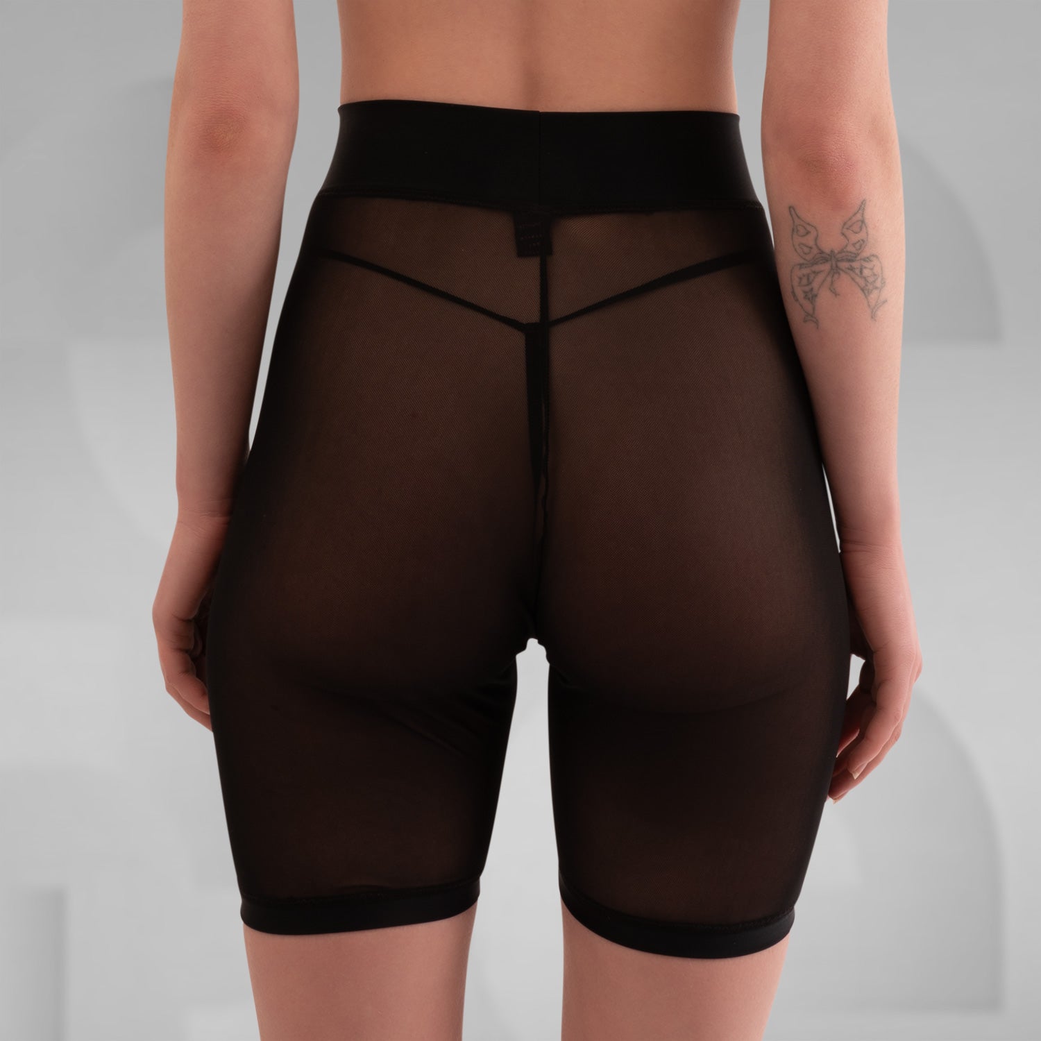 Styl black and white biker mesh shorts designed for ultimate comfort, perfect for summer parties or hot days in Berlin. The breathable fabric ensures a cool fit, making them an ideal addition to your summer wardrobe.