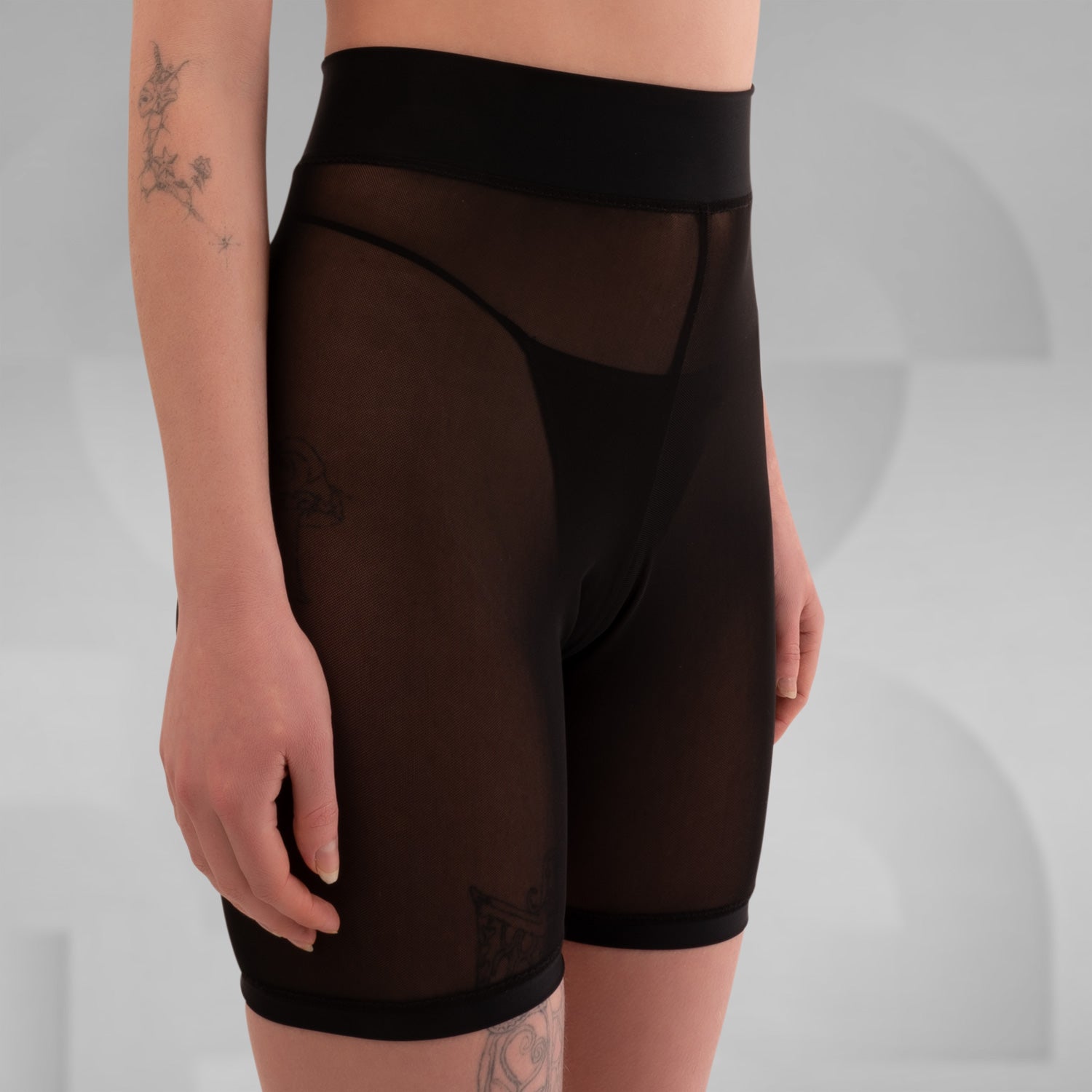 Styl black and white biker mesh shorts designed for ultimate comfort, perfect for summer parties or hot days in Berlin. The breathable fabric ensures a cool fit, making them an ideal addition to your summer wardrobe.