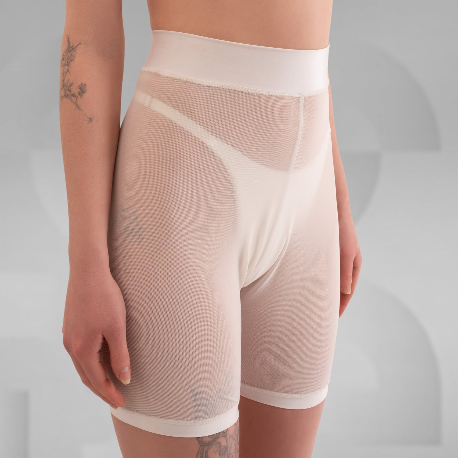 Styl black and white biker mesh shorts designed for ultimate comfort, perfect for summer parties or hot days in Berlin. The breathable fabric ensures a cool fit, making them an ideal addition to your summer wardrobe.