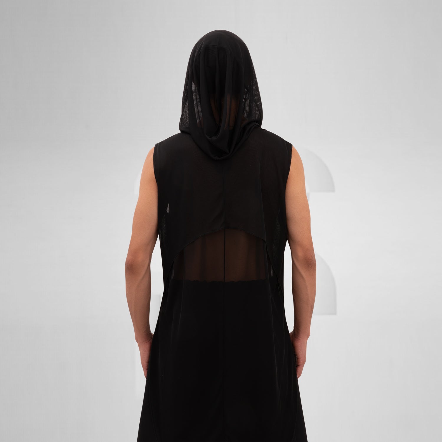The Mesh Avant-Garde Shirt with Hood from This is Fred offers a bold and innovative design that stands out in any fashion landscape. This unique piece features a lightweight mesh fabric that drapes beautifully, providing both comfort and a striking aesthetic. The hood adds an edgy twist, making it perfect for the techno dance floor or as a statement piece for your street style. 