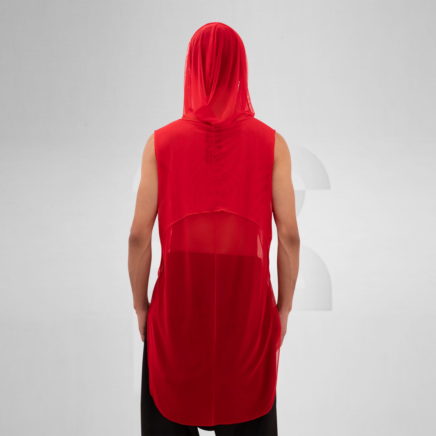 The Mesh Avant-Garde Shirt with Hood from This is Fred offers a bold and innovative design that stands out in any fashion landscape. This unique piece features a lightweight mesh fabric that drapes beautifully, providing both comfort and a striking aesthetic. The hood adds an edgy twist, making it perfect for the techno dance floor or as a statement piece for your street style. 