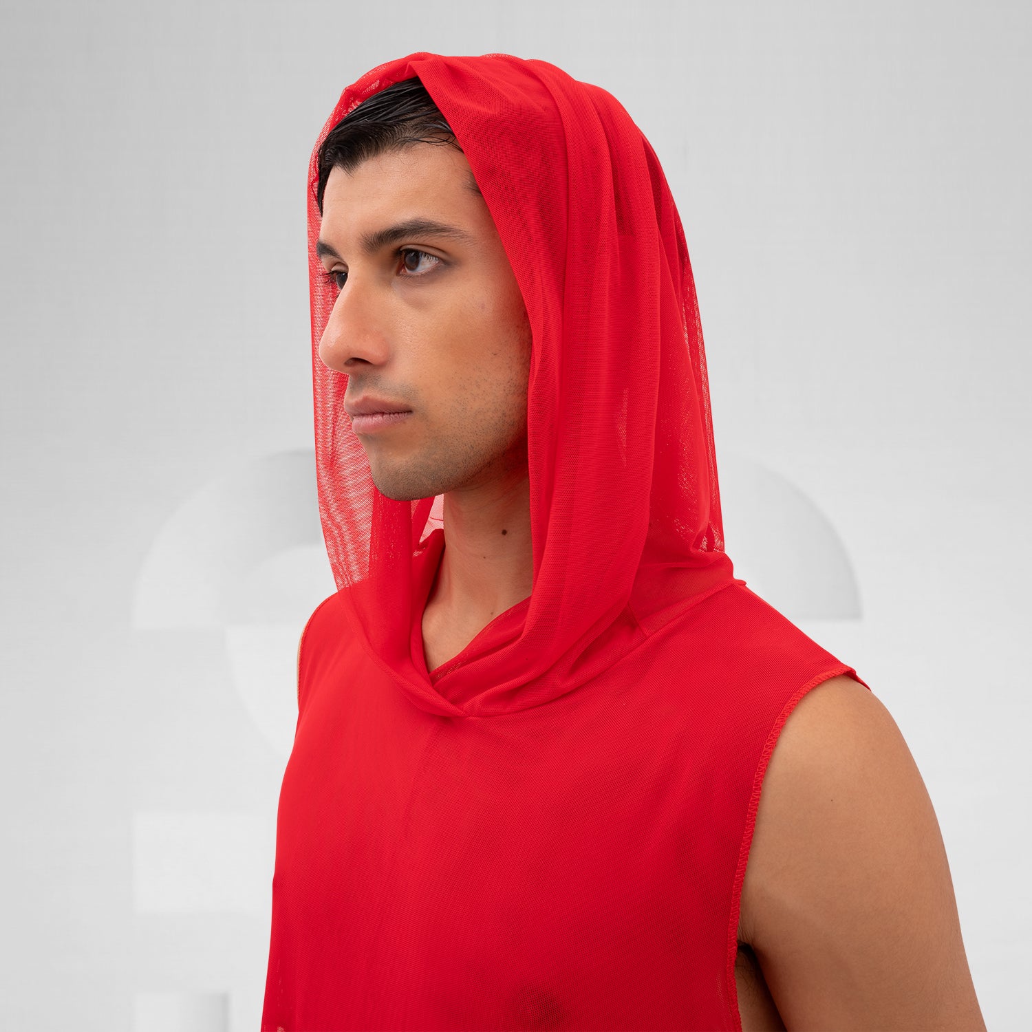 The Mesh Avant-Garde Shirt with Hood from This is Fred offers a bold and innovative design that stands out in any fashion landscape. This unique piece features a lightweight mesh fabric that drapes beautifully, providing both comfort and a striking aesthetic. The hood adds an edgy twist, making it perfect for the techno dance floor or as a statement piece for your street style. 