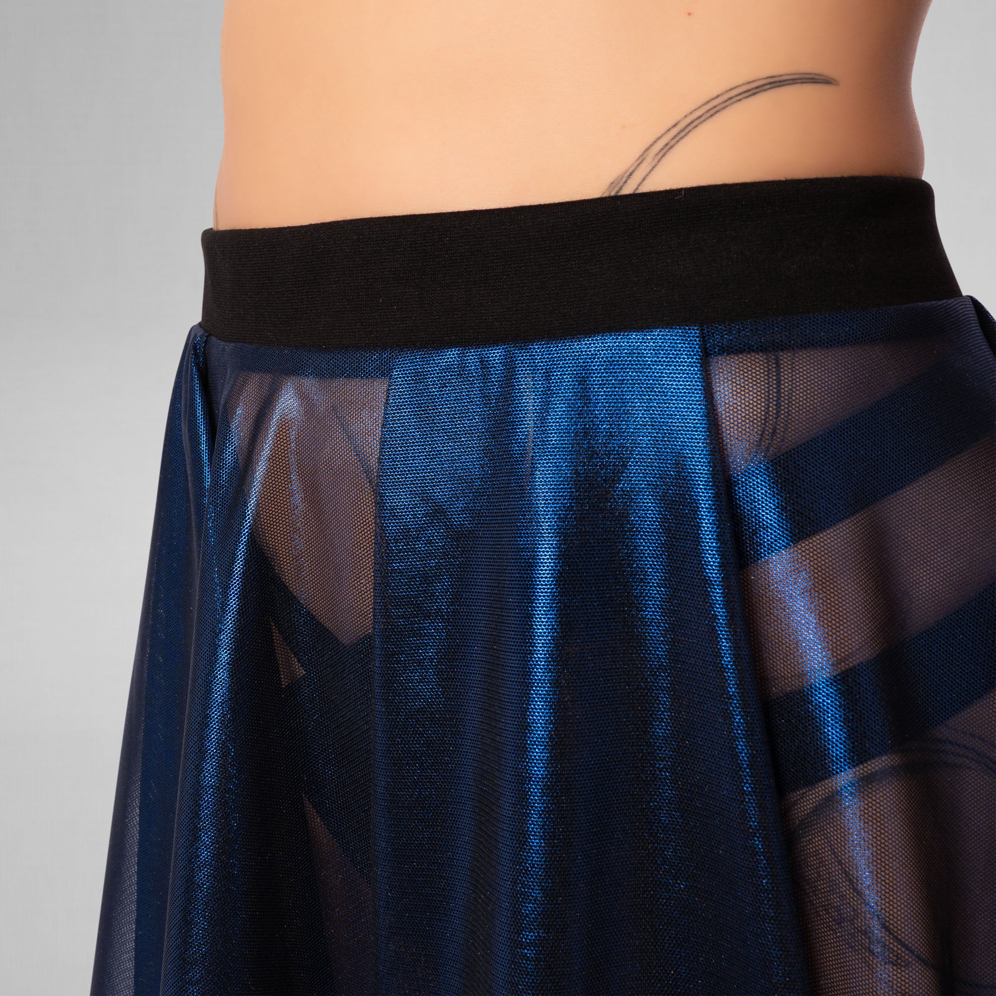 Navy blue sheer skirt with black waistband on a neutral background