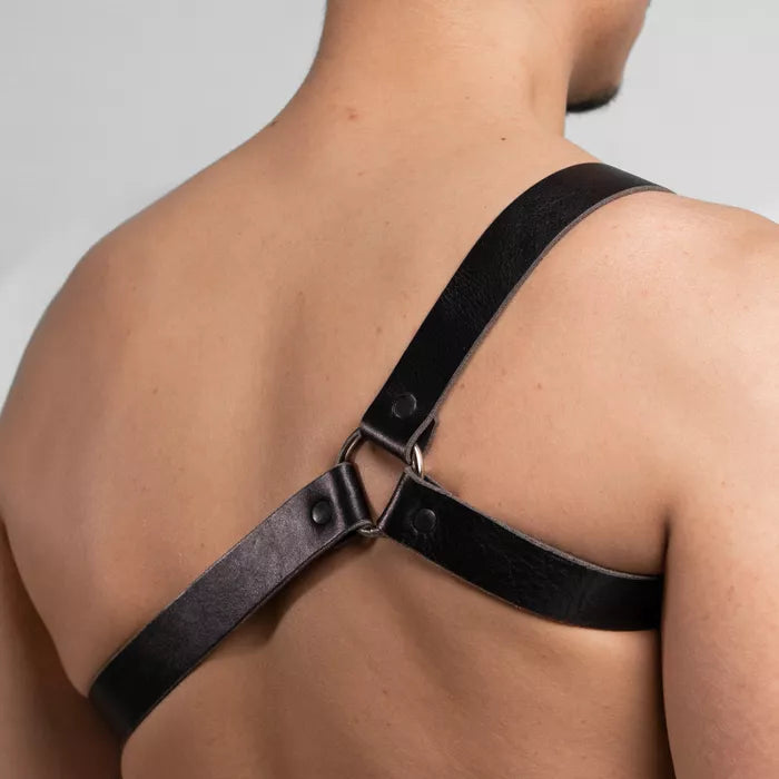 Sleek unisex black leather shoulder harness made from durable cowhide, your bold style statement.