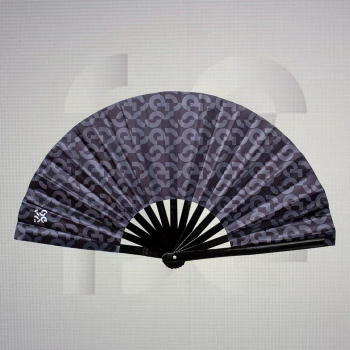 The Printed Dance Floor Fan from The Code features a sleek design in deep hues, adorned with bold patterns that exude modern sophistication. This stylish fan not only keeps you cool as you dance the night away but also serves as a chic accessory that enhances any outfit. Lightweight and portable, it’s the perfect companion for nightlife enthusiasts looking to make a striking statement.